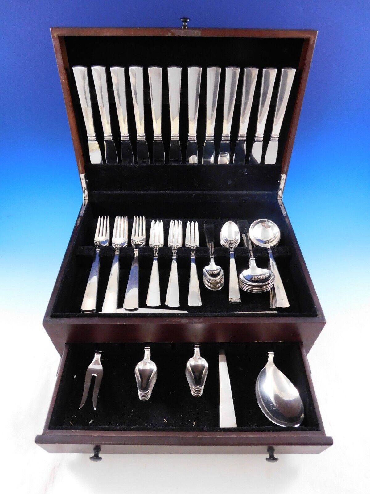 Bell by Peter Hertz Danish Mid-Century Modern sterling silver flatware set - 76 Pieces. This set includes:

12 dinner knives, 8 3/4