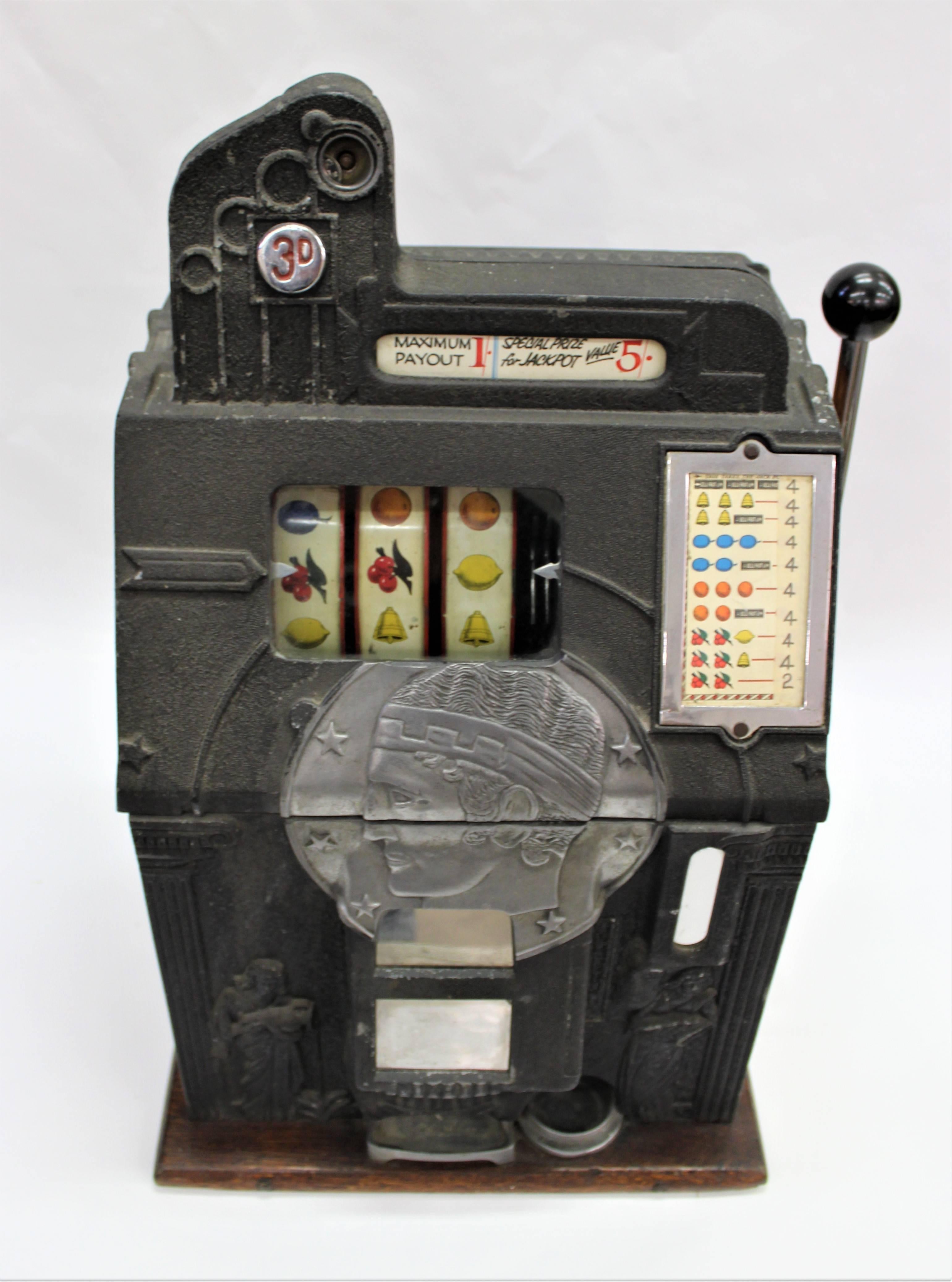 This vintage English Bell Fruit Gum Co. coin operated gambling slot machine was made with Watling Mfg Company from Chicago Illinois inside parts and scales. In England the threepence (3d) coin was used until 1971, not sure of the age of this slot