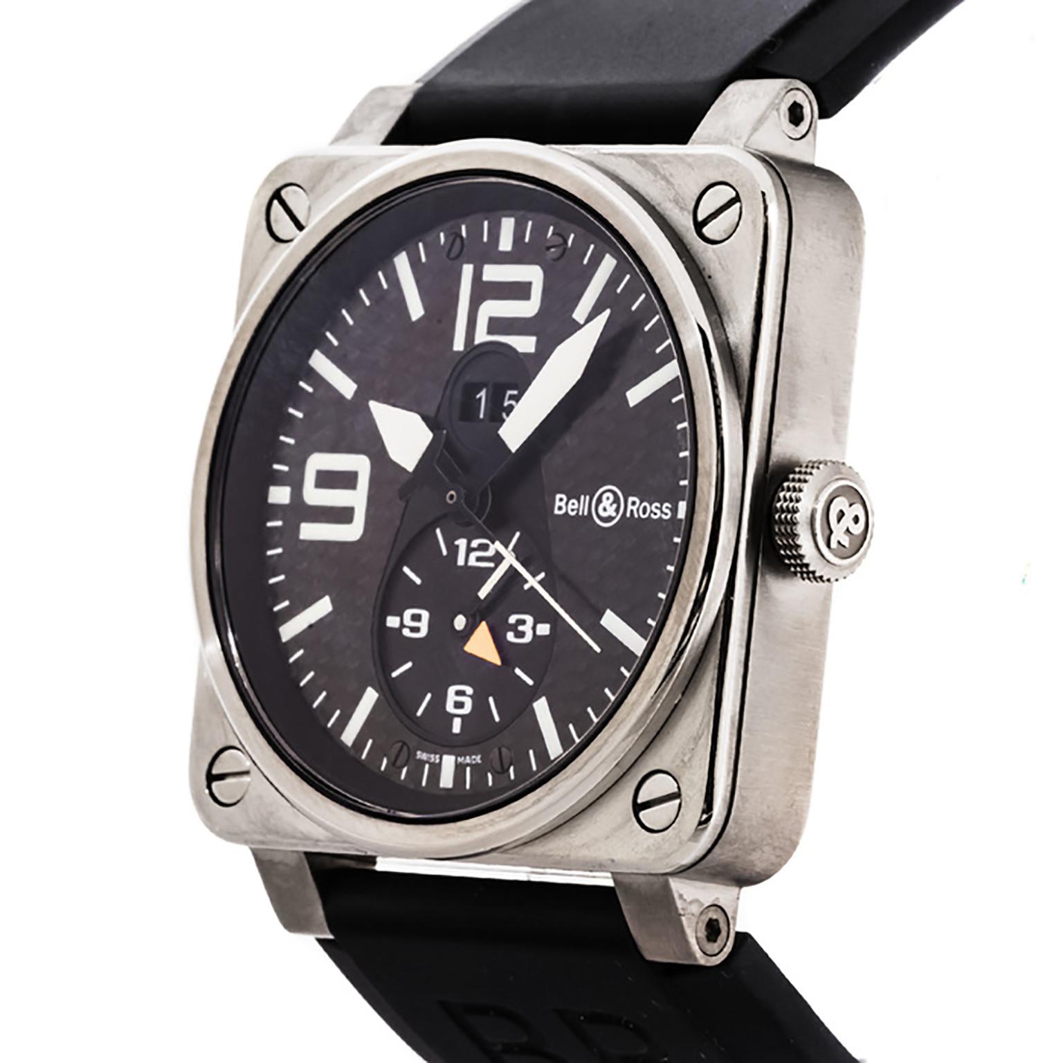 Bell & Ross BR03-51 GMT titanium & stainless steel case with a black rubber strap and stainless steel buckle. Black dial with white hands and white index - tan Arabic numerals hour markers. Movement: Automatic. Dial Type: Analog. Date display at 12