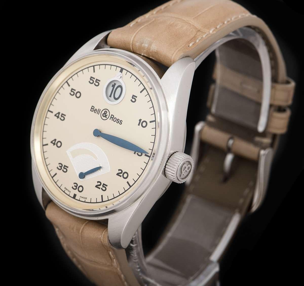 A Platinum Limited Edition 123 Jumping Hour Gents Wristwatch, cream dial with jumping hour aperture at 12 0'clock, power reserve indicator at 6 0'clock, a fixed platinum bezel, an original beige leather strap with an original platinum pin buckle,