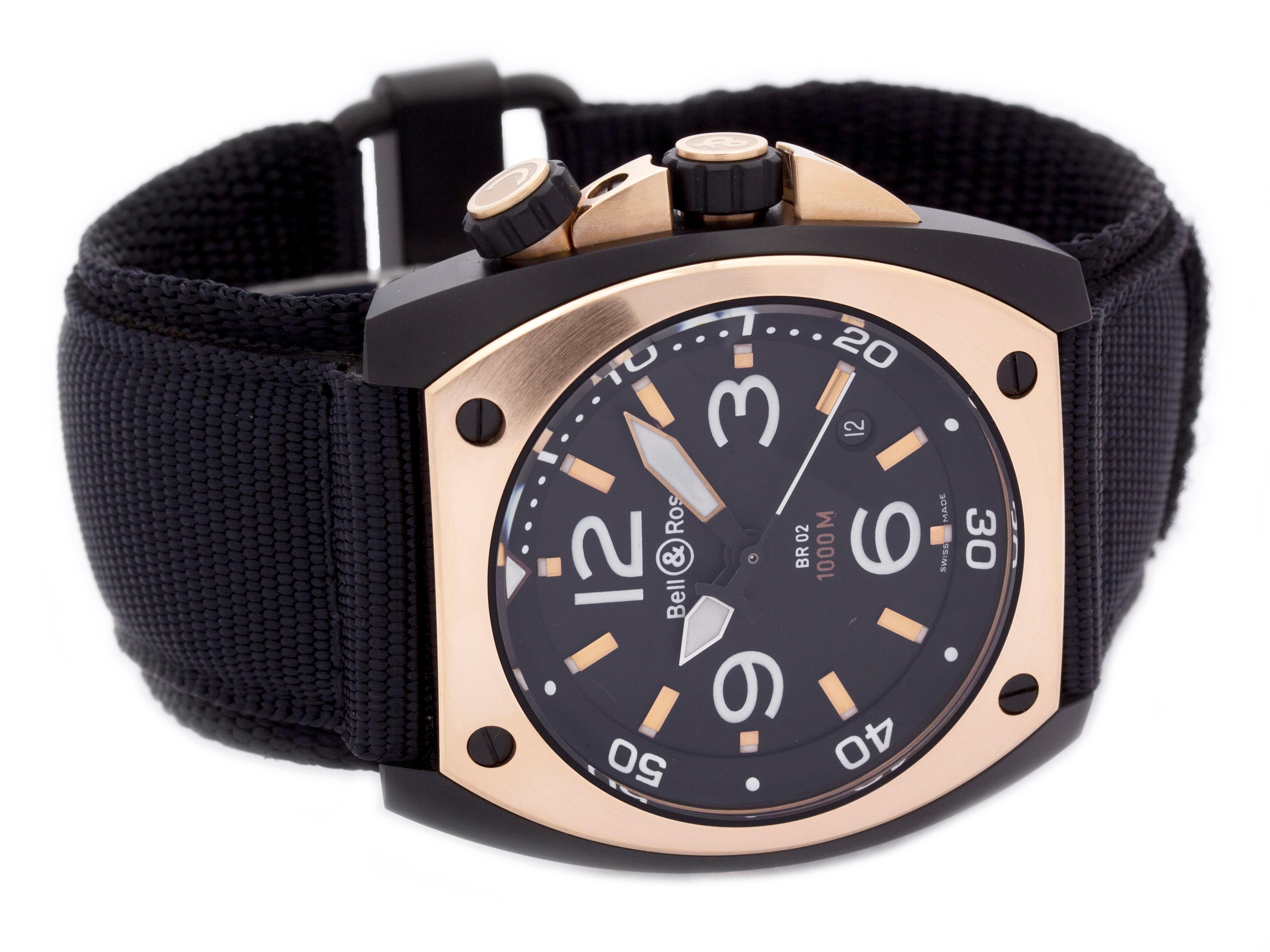 18K Rose Gold & PVD Steel Bell & Ross Marine 92 BR02-PINKGOLD-CA watch, water resistance to 1000m, with date and nylon strap.

Watch	
Brand:	Bell & Ross
Series:	Marine 92
Model #:	BR02-PINKGOLD-CA
Gender:	Men’s
Condition:	Great Display Model, Faint