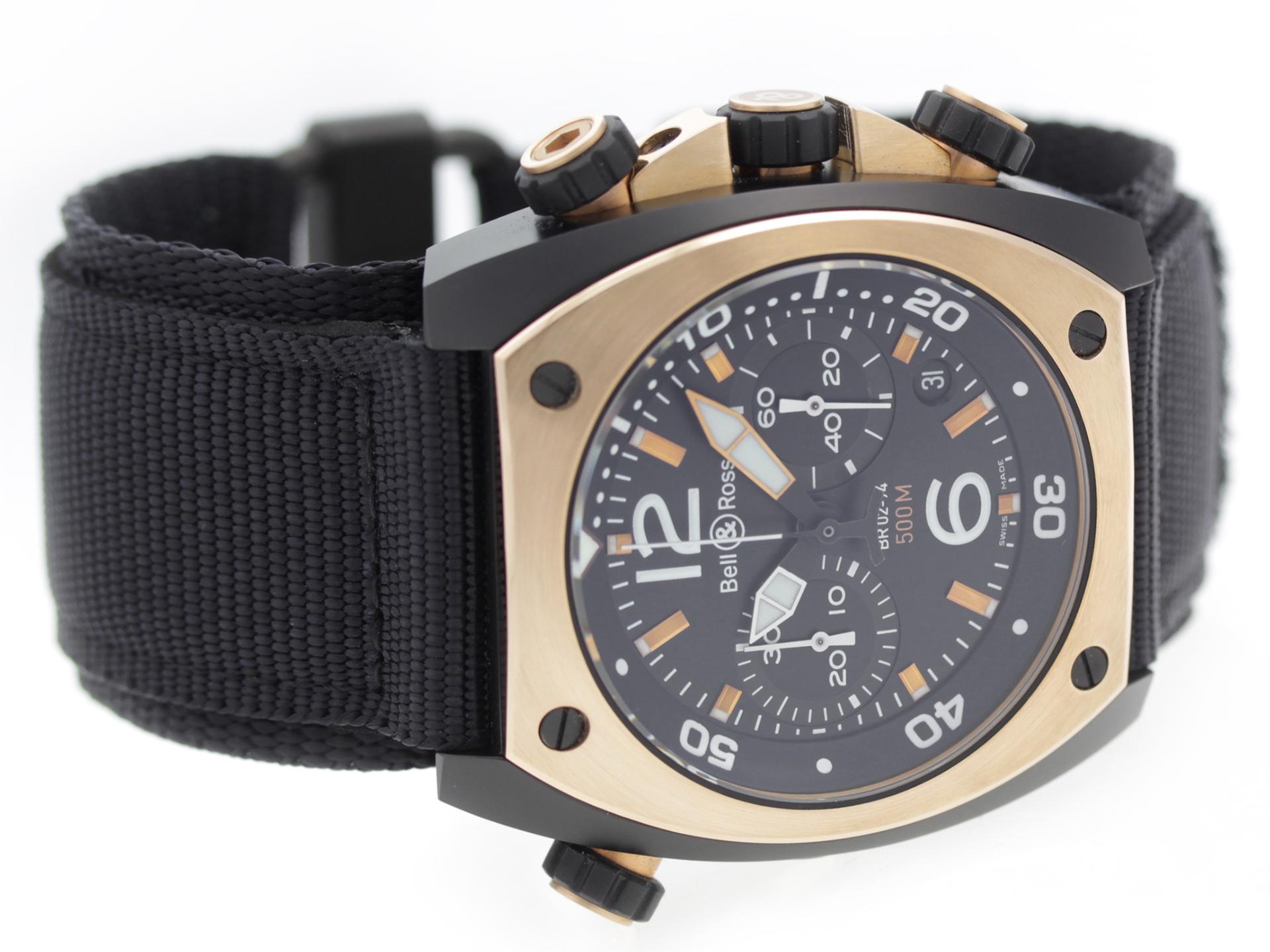 18K Rose Gold & PVD Steel Bell & Ross Marine 94 BR02-CHR-BICOLOR watch, water resistance to 500m, with date, chronograph, and nylon strap.

Watch	
Brand:	Bell & Ross
Series:	Marine 94
Model #:	BR02-CHR-BICOLOR
Gender:	Men’s
Condition:	Excellent
