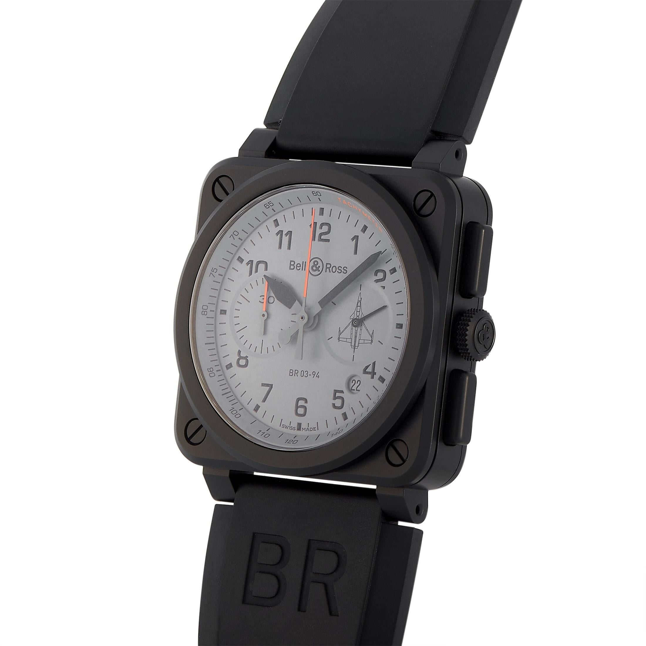 This watch from Bell & Ross features the iconic Bell & Ross square case shape with a round bezel that is highly recognizable. The case is made of black ceramic and measures 42mm. It is presented on a black rubber strap with tang closure. The grey