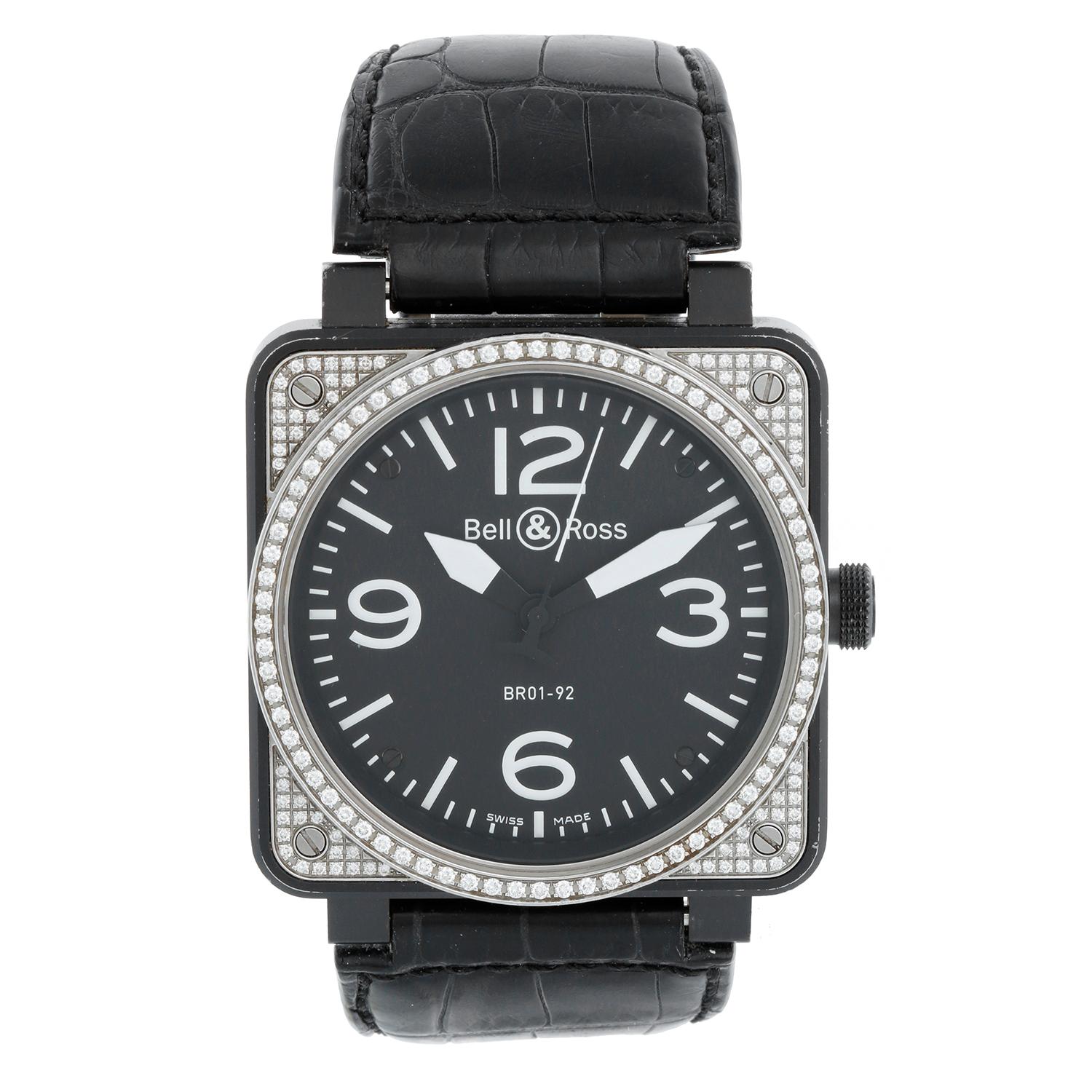 Bell & Ross Stainless Steel Diamond Automatic Mens Watch BR01-92 - Automatic. Stainless steel with Carbon coating; cushion shaped case with diamond bezel ( 46 mm ). Black dial with Arabic and stick numerals. Black leather Bell & Ross Strap with tang