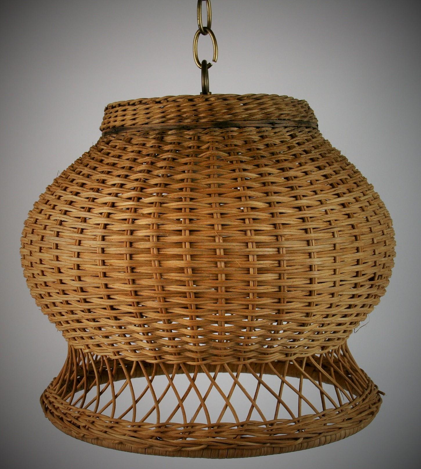 3-416 bell shaped hand made wicker pendant light
Takes one 100 watt max Edison based bulb
Rewired
Supplied with 3 feet chain and canopy.