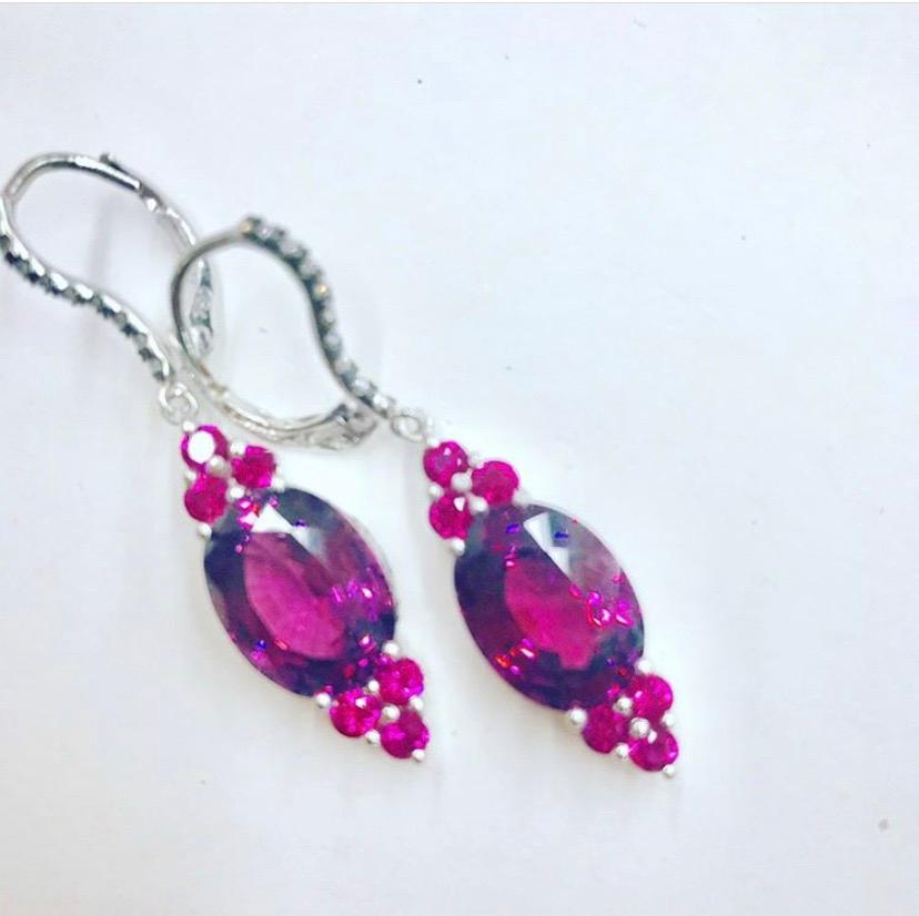 Pink Malaya Garnet centers Accented with Burmese Rubies and Diamonds in 18 K White Gold.Dangling Earrings with Lever Backs. One Of a Kind, Made in NYC.
Malaya Pink Garnet 12.71 CT's Total Weight
12 Burmese Rubies 1.37 CT's Total Weight
Diamonds .35