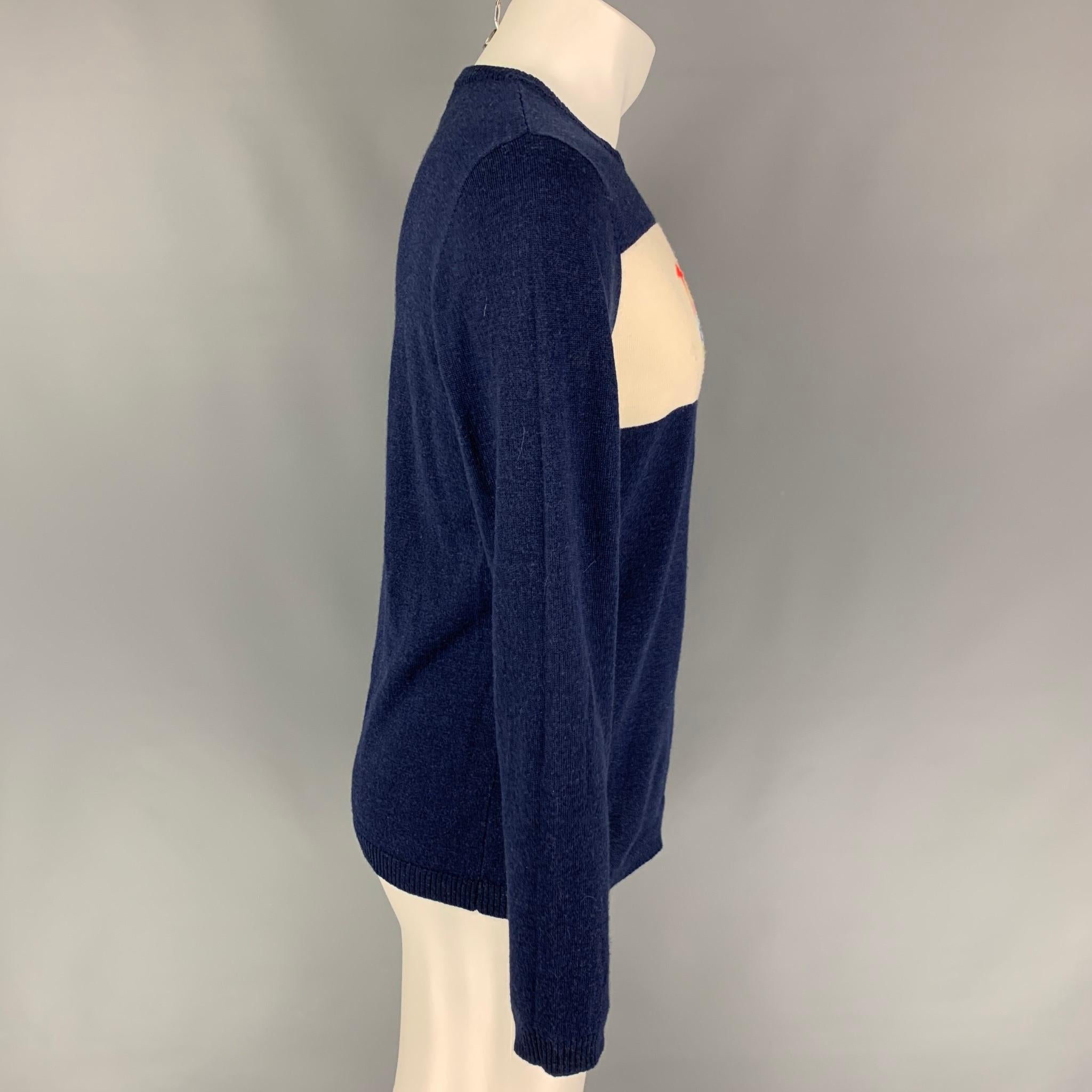 BELLA FREUD pullover comes in a navy knitted wool featuring a multi-color '1970' detail and a crew-neck.

Very Good Pre-Owned Condition.
Marked: M

Measurements:

Shoulder: 17.5 in.
Chest: 38 in.
Sleeve: 28.5 in.
Length: 26 in. 
