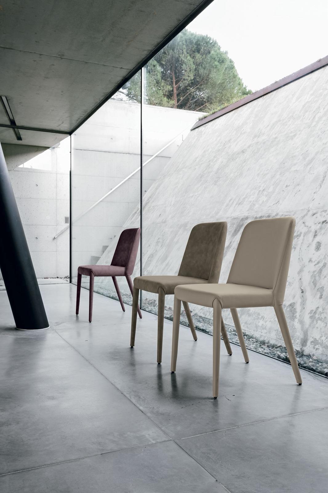 The Bella Vita Chair is a refined expression of Italian design, blending sleek proportions with exceptional comfort. Upholstered in soft, eco-friendly nabuk and genuine leather, it offers a sophisticated look that complements both modern and