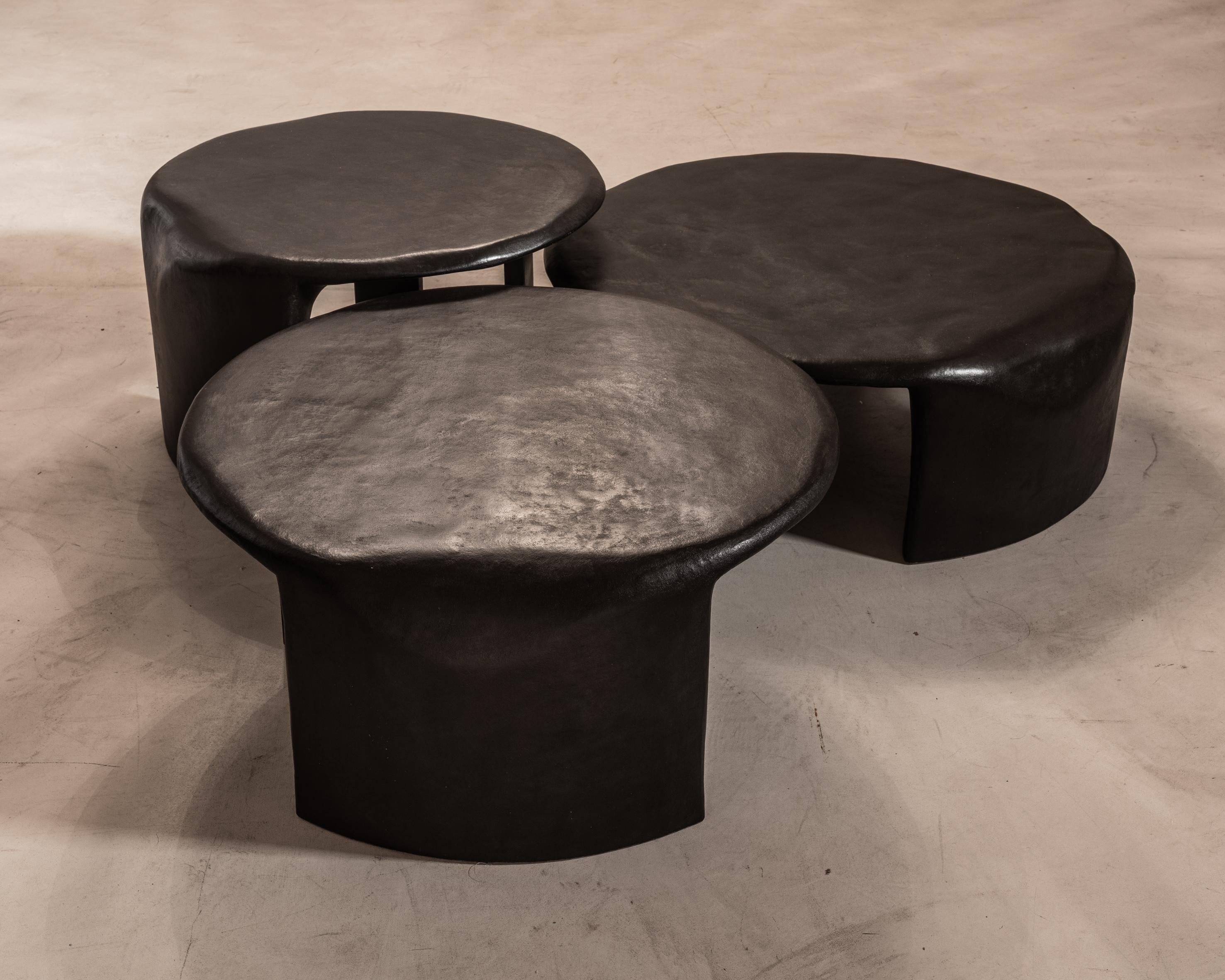 Bellagio coffee table set by Studio Emblématique
Dimensions: 
D 70 cm x H 42 cm
D 80 cm x H 33 cm
D 90 cm/ D 110 x H 31 cm
Materials: Stonegrain table top with conical metal hammered legs

Pushing the boundaries, going the extra mile to find