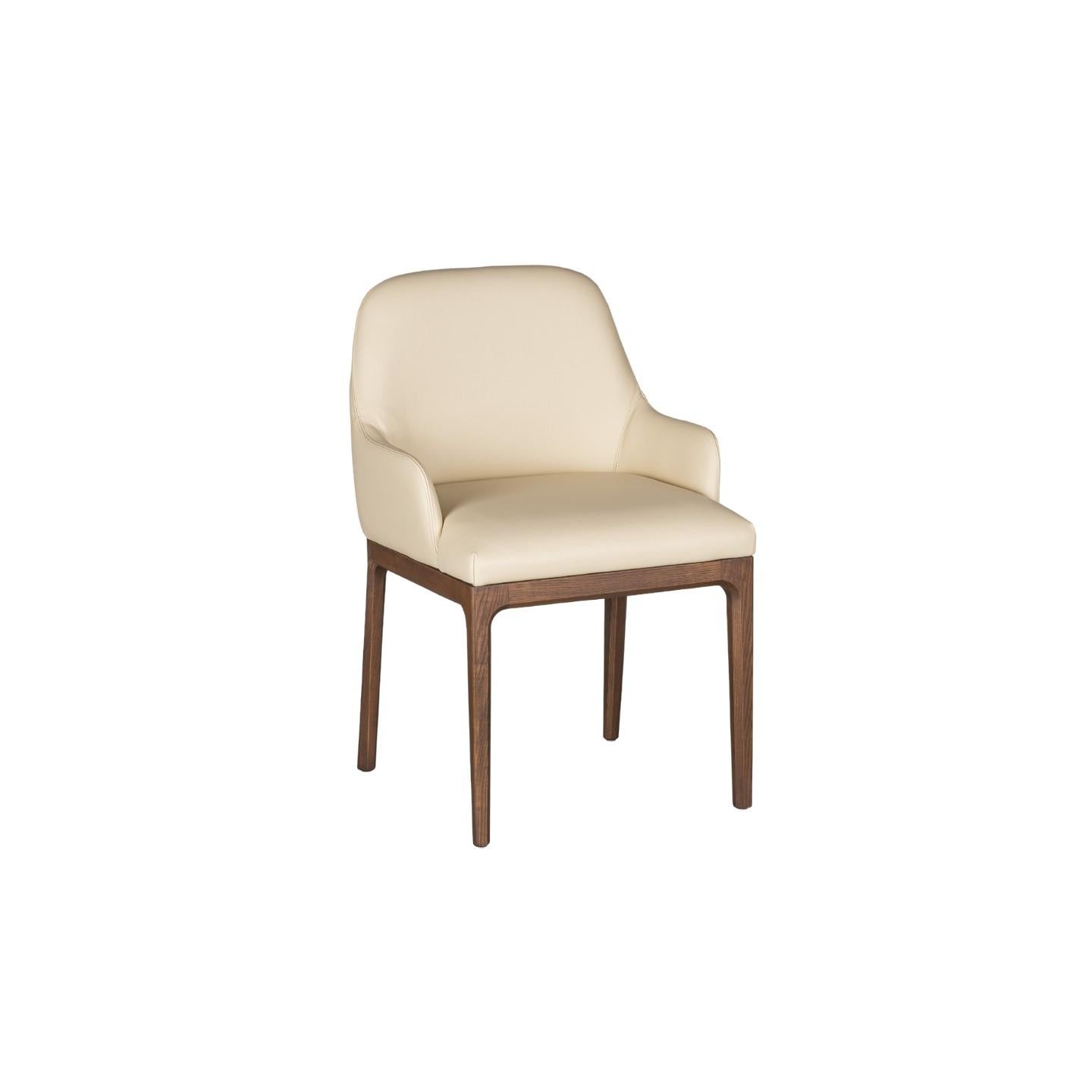 Bellagio Sessel im zeitgenössischen Stil aus Eschenholz mit gepolstertem Sitz aus Leder oder Stoff.
Entwurf Libero Rutilo