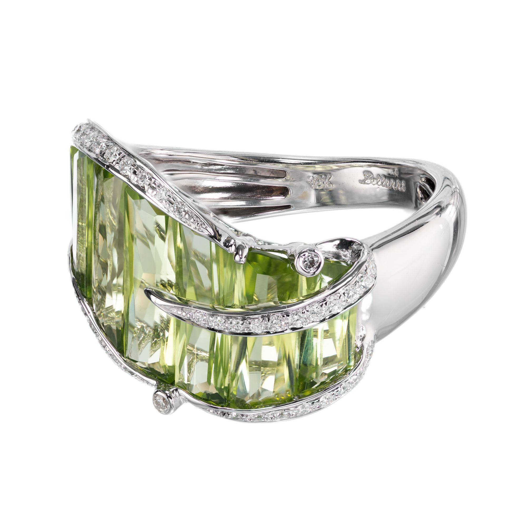 Bellari peridot and diamond cocktail ring. Custom cut Peridot accented with 47 round full cut diamonds in a 18k white gold setting. 

7 fancy cut peridot, approx. 5.95cts
47 round full cut diamonds, H VS approx. .21cts
Size 7 sizable 
18k white gold