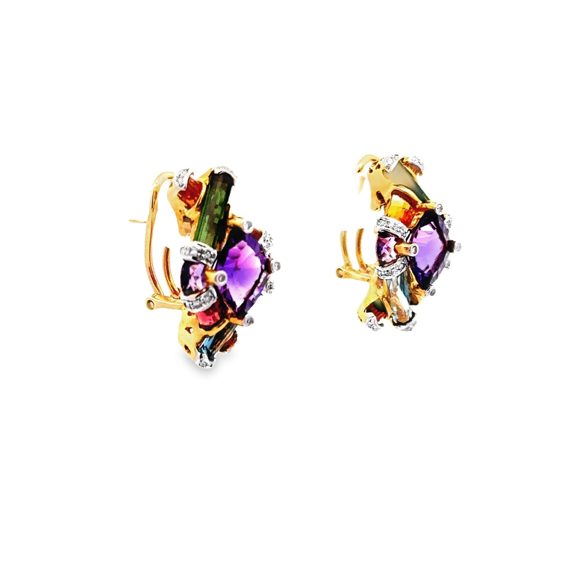 A bold pair of earrings with stunning and vibrant gemstones, while glittering natural diamonds add a brightness and solar style to the piece. This very finely crafted pair of earrings made in 18k yellow gold. They featured 0.28 carats of pave-set