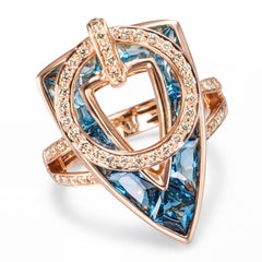 Bellarri Fidget-Ring aus 14-karätigem Roségold mit blauem Topas und Diamanten