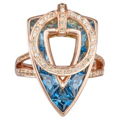 Bellarri Fidget-Ring aus 14-karätigem Roségold mit blauem Topas und Diamanten