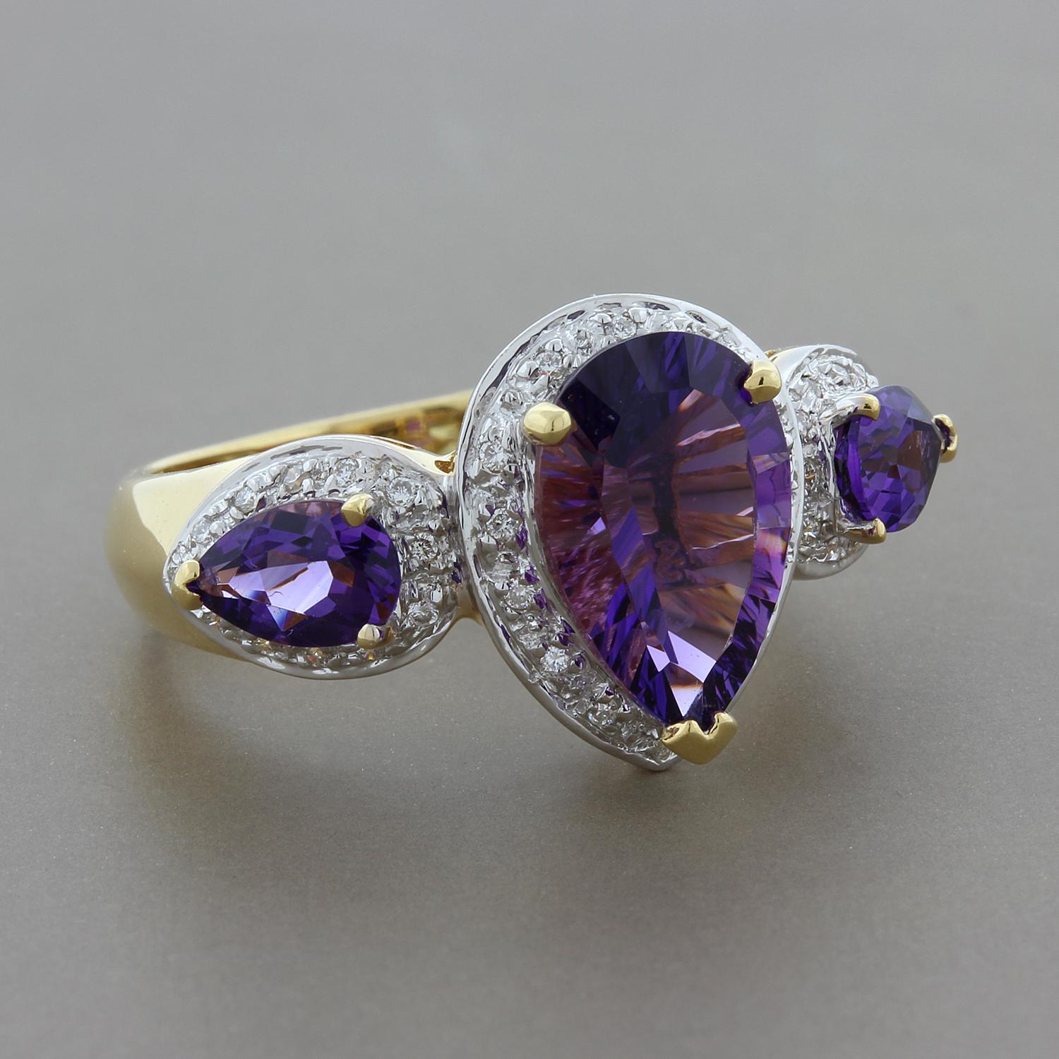 A Bellarri original, this piece features 3 pear shape amethysts weighting a total of 2.58 carats. They are each haloed by round cut diamonds totaling 0.12 carats, all set in 18K yellow gold.

Currently ring size 6.75