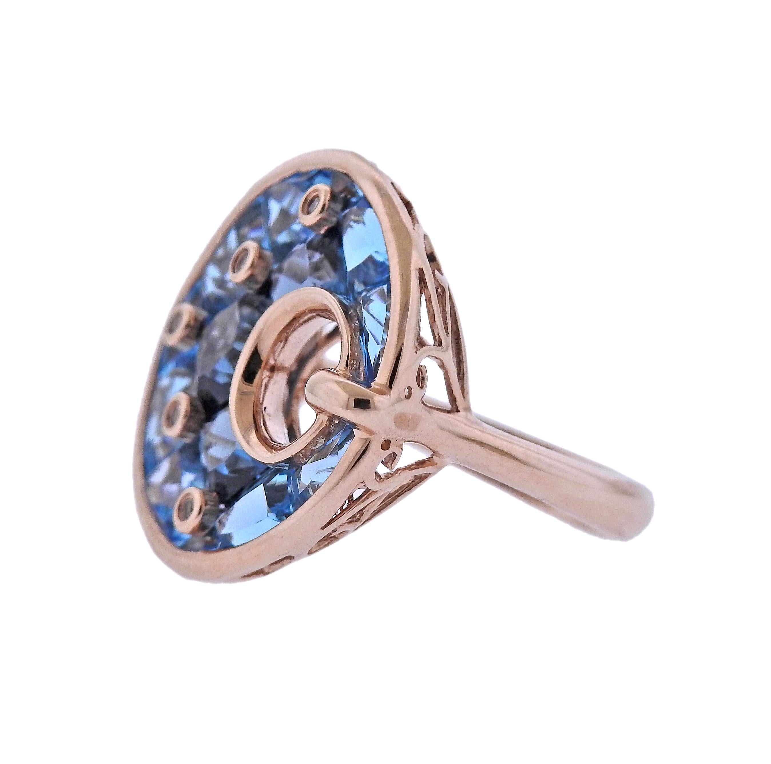 Featuring 14k rose gold ring from Hava Nouveau collection, set with 0.05ctw in H/VS diamonds and 8.35ctw in blue topaz. All Bellarri jewelry is brand new with tags. Ring Size - 7, 22mm in diameter. Weight - 7.8 grams. Marked Bellarri 14k.