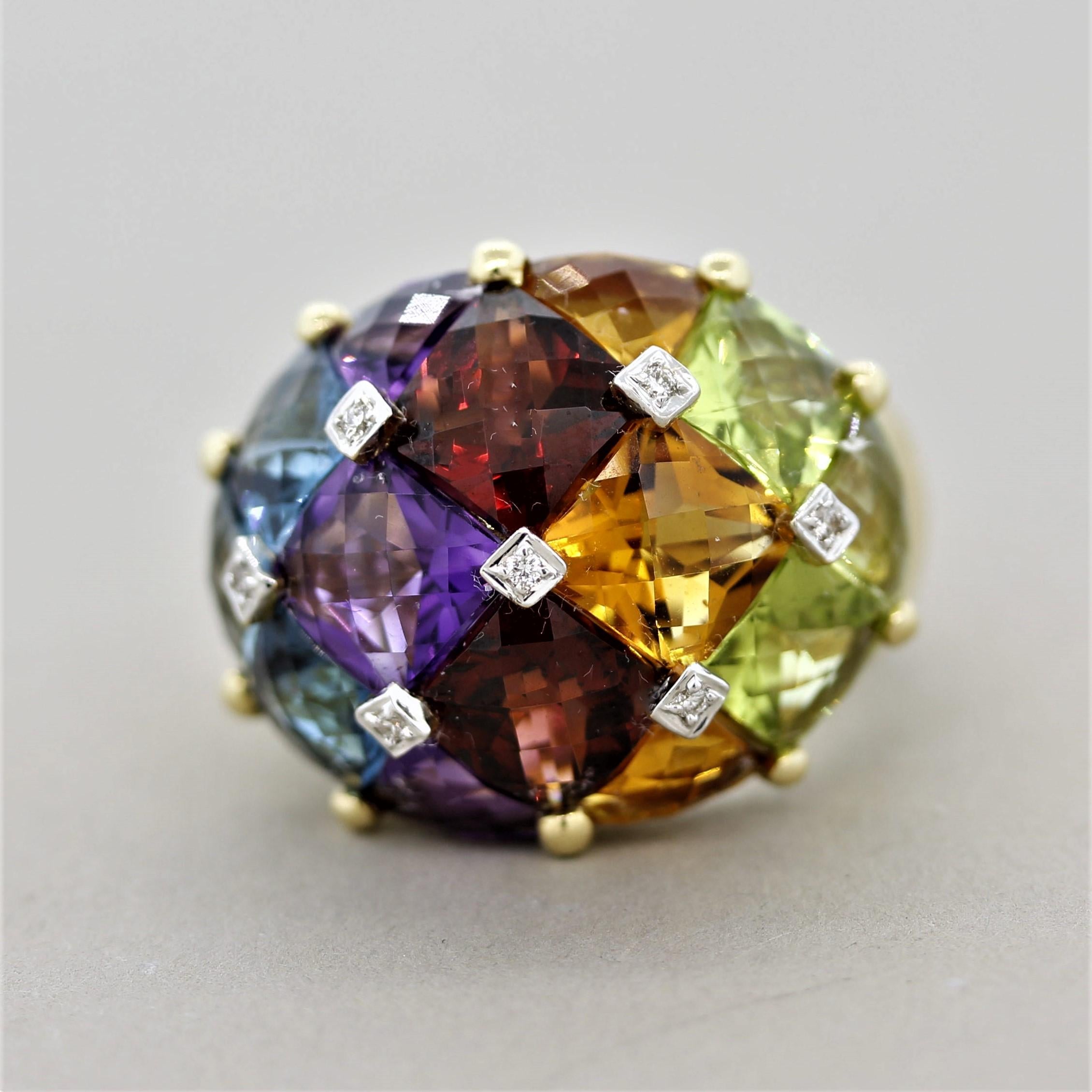 A stunning piece by Bellarri and an excellent example of their multi-colored designs. This dome shaped ring features 14.15 carats of multi-colored gemstones which include peridot, citrine, garnet, amethyst, and topaz! Each gem brings a bright unique