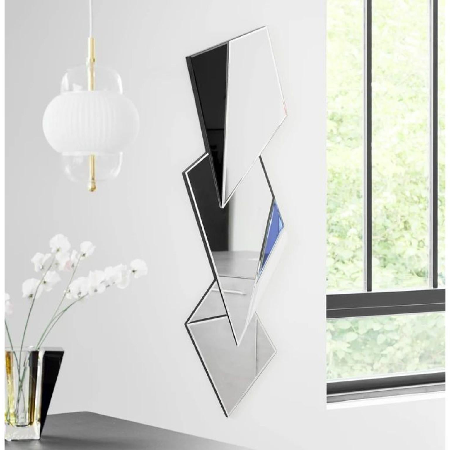 Bellatrix mirror 
Dimensions: W 58.2 x D 2.5 x H 132 cm
Material: 4 mm faceted mirror on black painted MDF
Weight: 8 kg

Bellatrix & Polaris mirrors feature searing looks inspired by the temptation of geometric lines. They are marked by