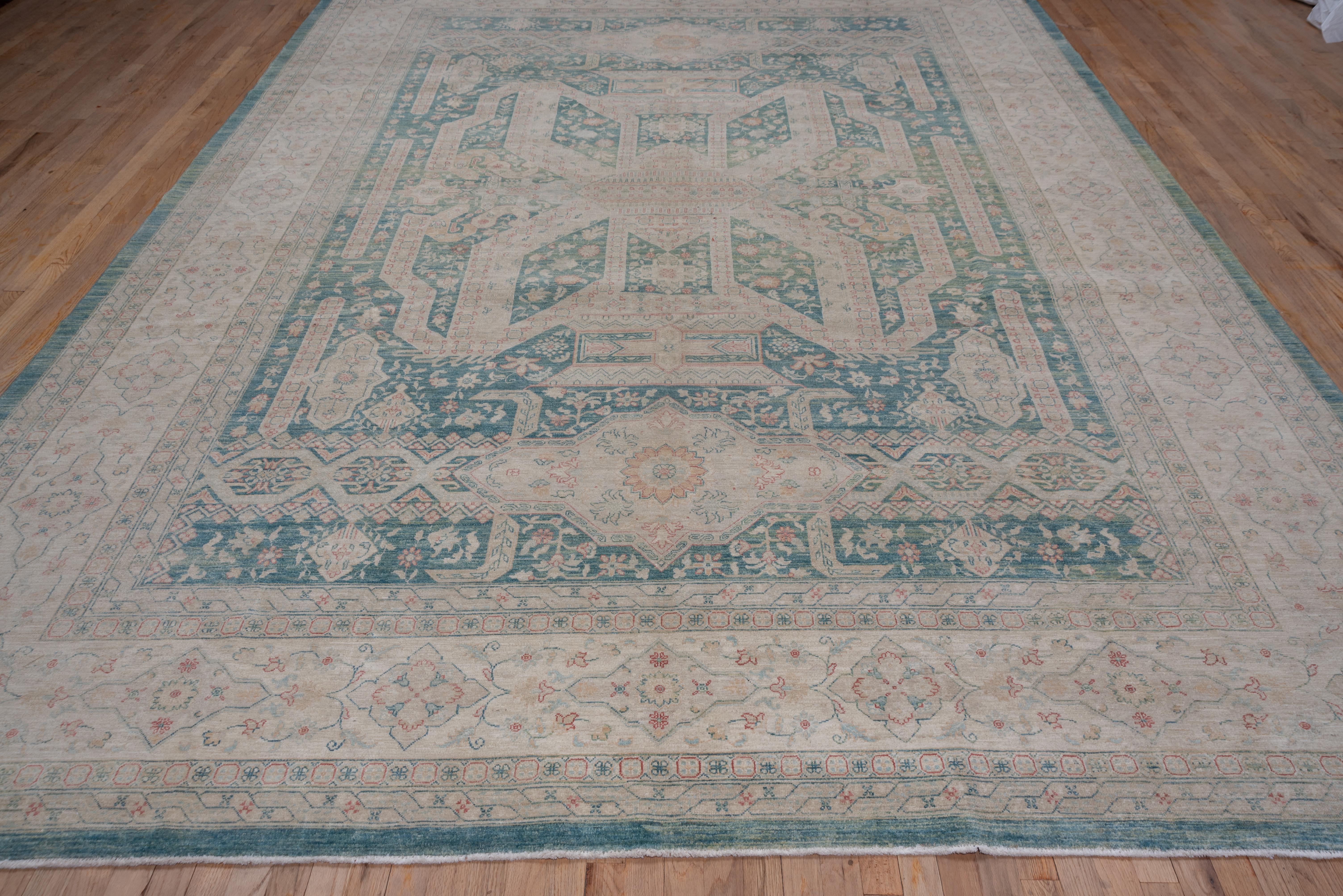 This gorgeous rug is a hand-knotted beauty from Afghanistan. Intricate florals woven beautifully into the more structured lines of the geometric grid. Wonderful color palette that would work nicely in a formal space or equally perfect in a bedroom.