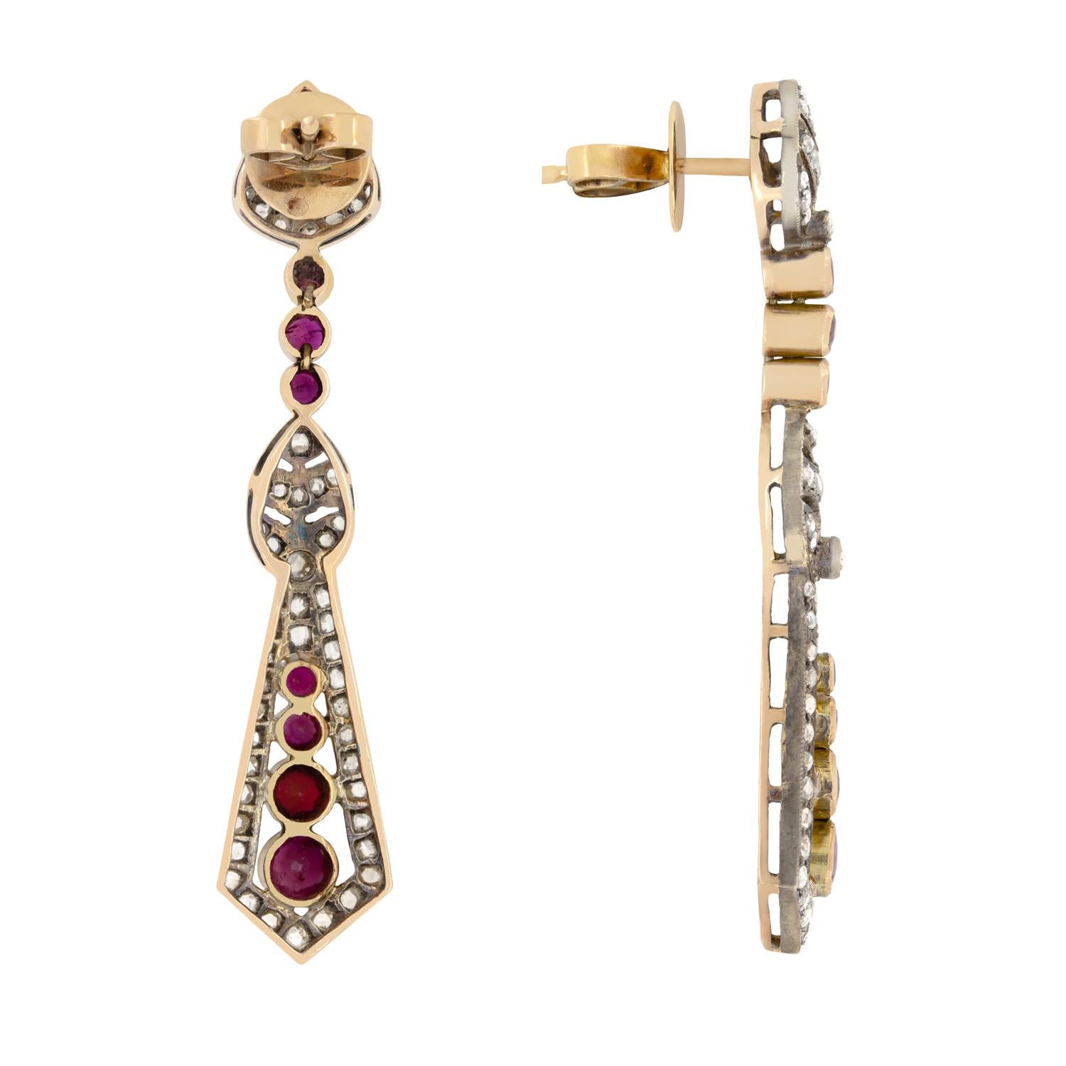 Hailing from 1880s these Belle Époque era drop earrings are stunning. Each earring is paved with 0.50 carat total of rose cut diamonds set into beautifully patinaed silver metalwork. Flowing down from the upper leaf design to the earring drop, and