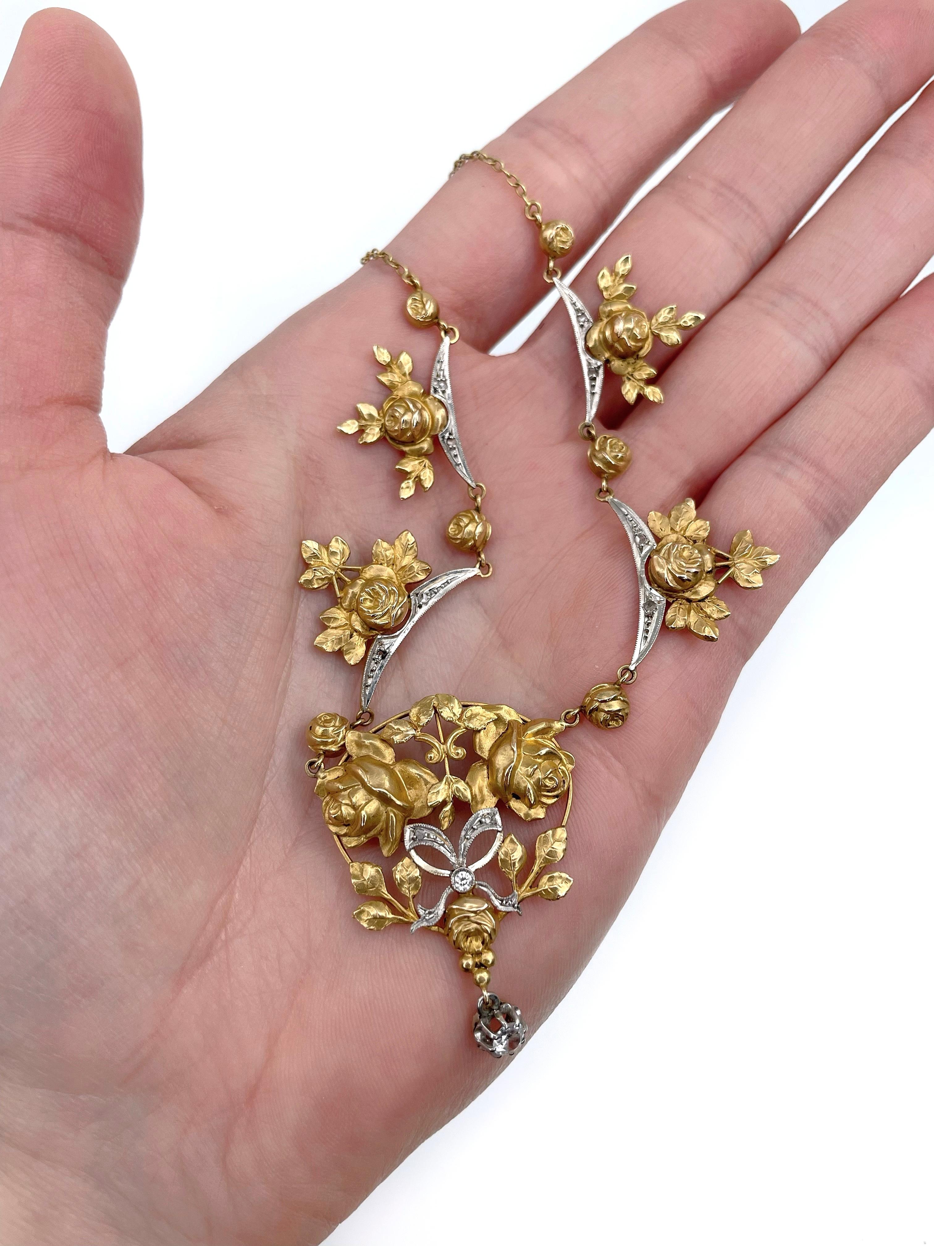 This is a stunning Belle Epoque rose motif floral design collier necklace crafted in 14K yellow gold. Circa 1900. It features old cut diamonds. The roses and petals are very detailed. 

It could be an amazing engagement or wedding gift as the roses