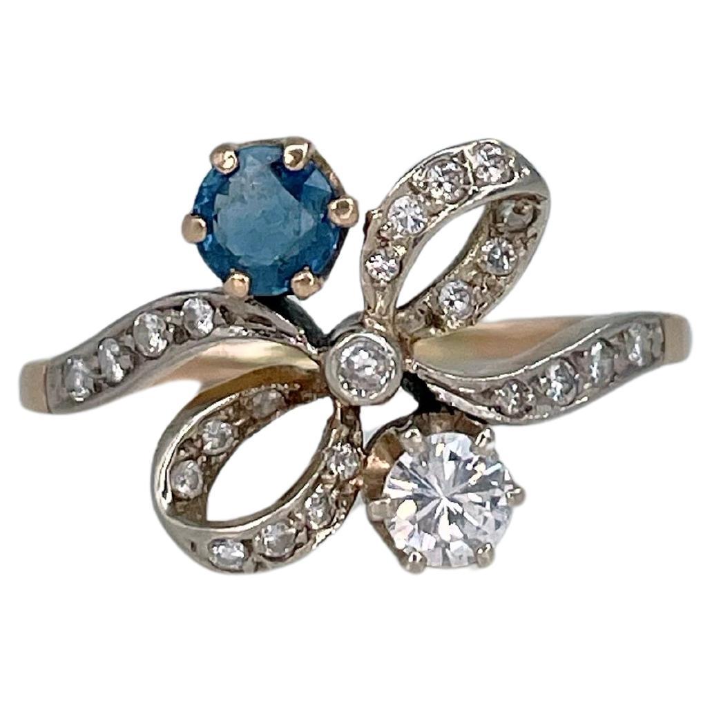 Belle Epoque 18 Karat Gold Sapphire Diamond Bow Design Engagement Ring For Sale