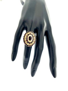 Belle-Epoque 18 karat Yellow Gold Princess Ring with Garnets