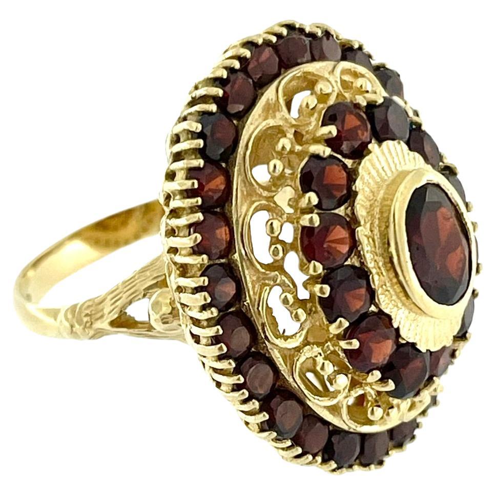 Belle-Epoque 18 karat Yellow Gold Princess Ring with Garnets For Sale