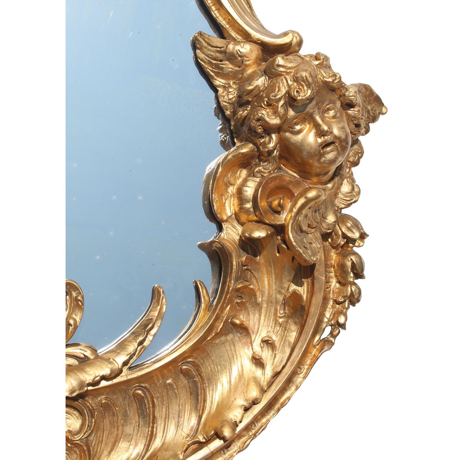 Espejo Querubín Tallado en Madera Dorada Estilo Luis XV de la Belle Epoque Siglos XIX-XX principios del siglo XX en venta