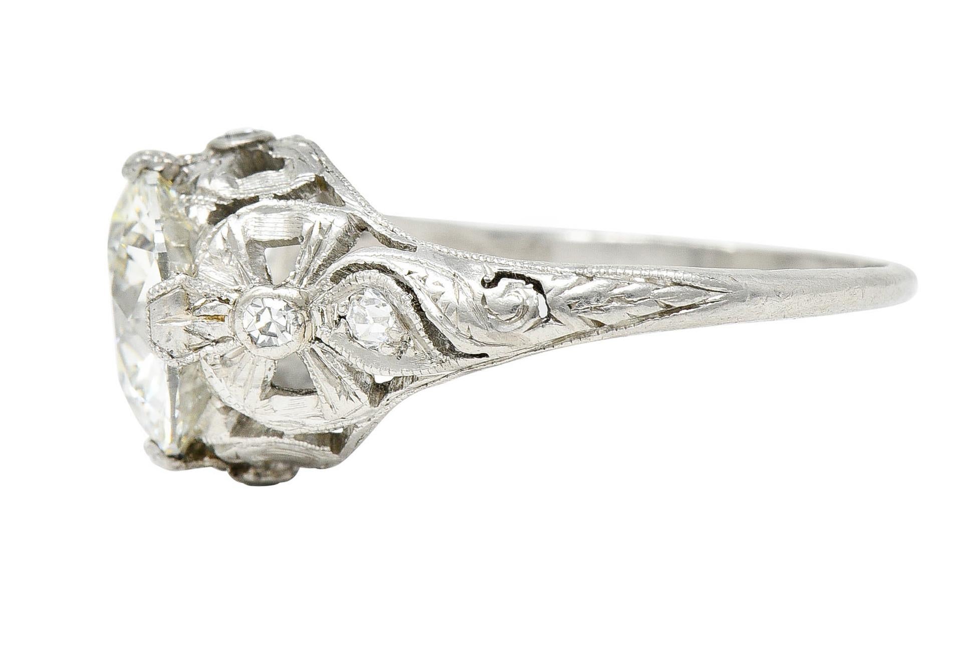 Belle Epoque 2.97 Carats European Diamond Platinum Bow Antique Engagement Ring In Excellent Condition For Sale In Philadelphia, PA