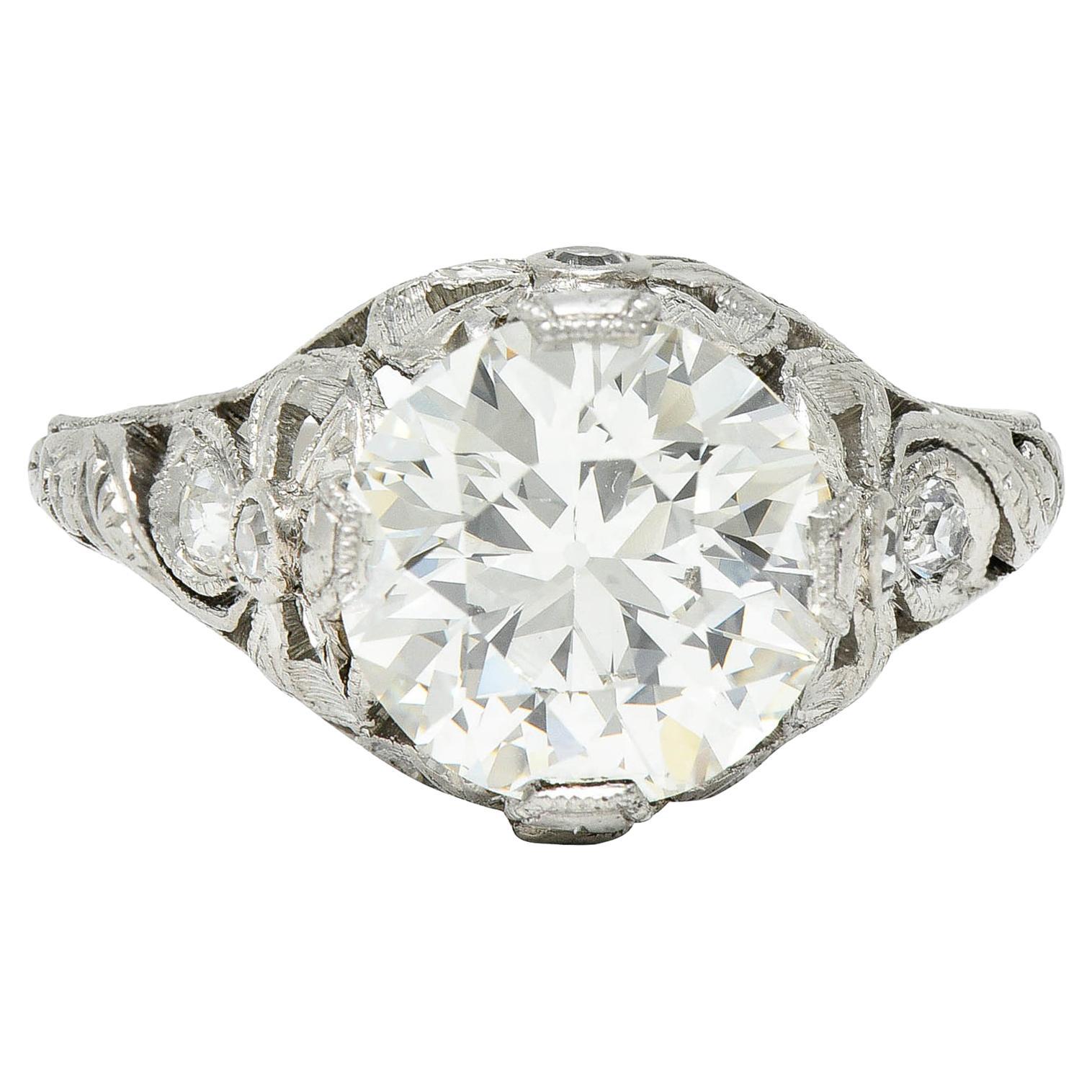 Belle Epoque 2.97 Carats European Diamond Platinum Bow Antique Engagement Ring For Sale