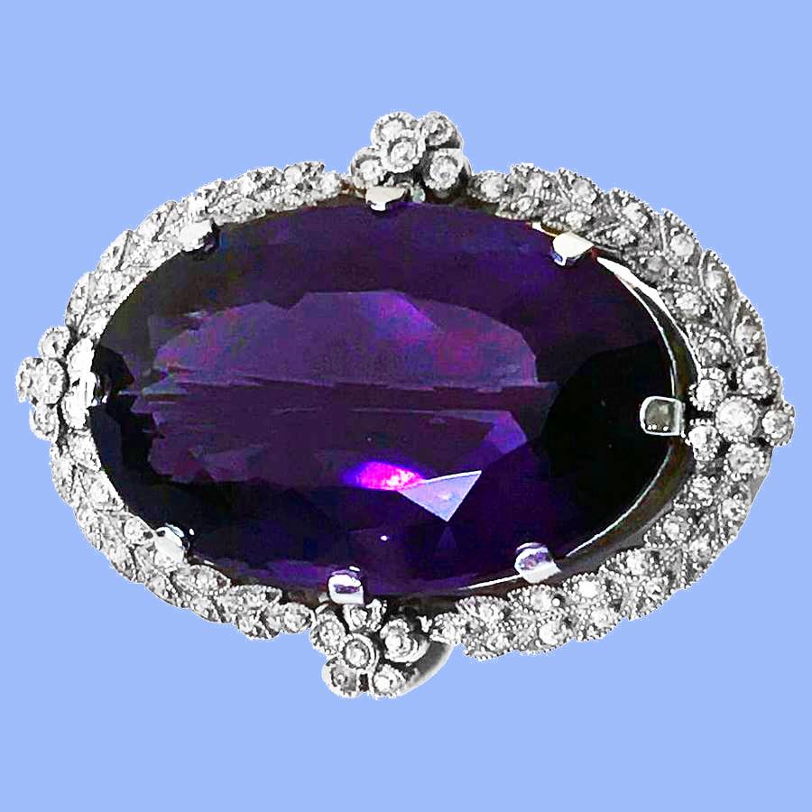 Antique Platinum Amethyst Diamond Brooch Pendant, English C.1910. The large Brooch Pendant set with a very fine oval medium-dark violet purple Amethyst, gauging approximately 33 x 20 x 12 mm, approximately 47.56 cts. The platinum milligrain and