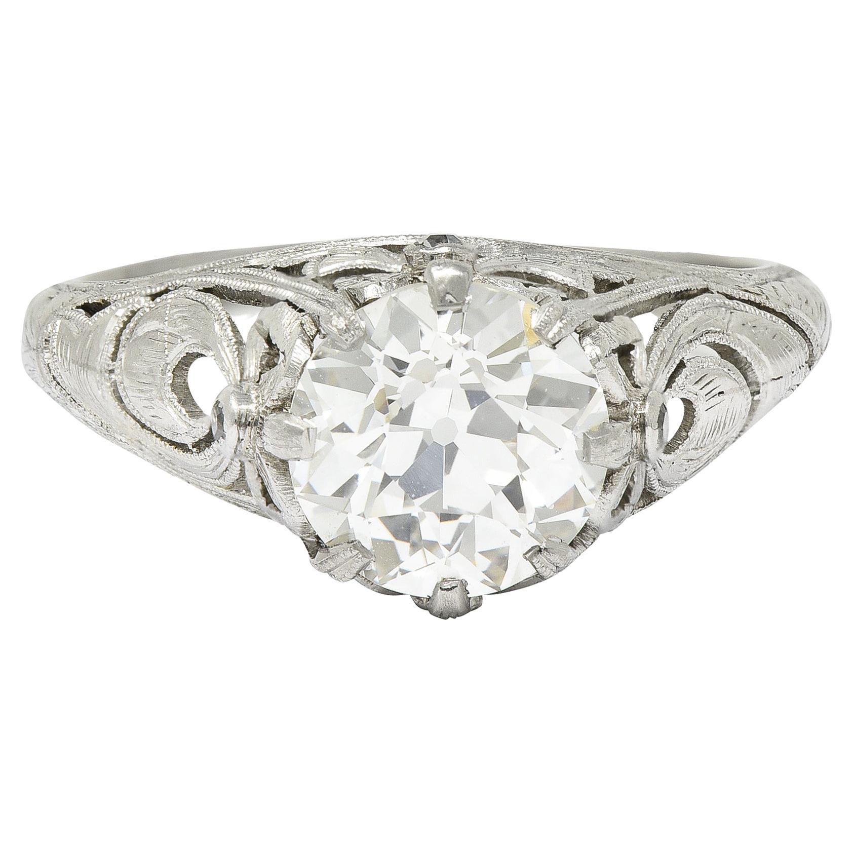 Belle Époque Antique 1.88 Carats Diamond Platinum Bow Engagement Ring GIA For Sale