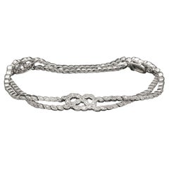 Belle Epoque Used Platinum and Diamond Lovers Knot Bracelet, Ca.1910