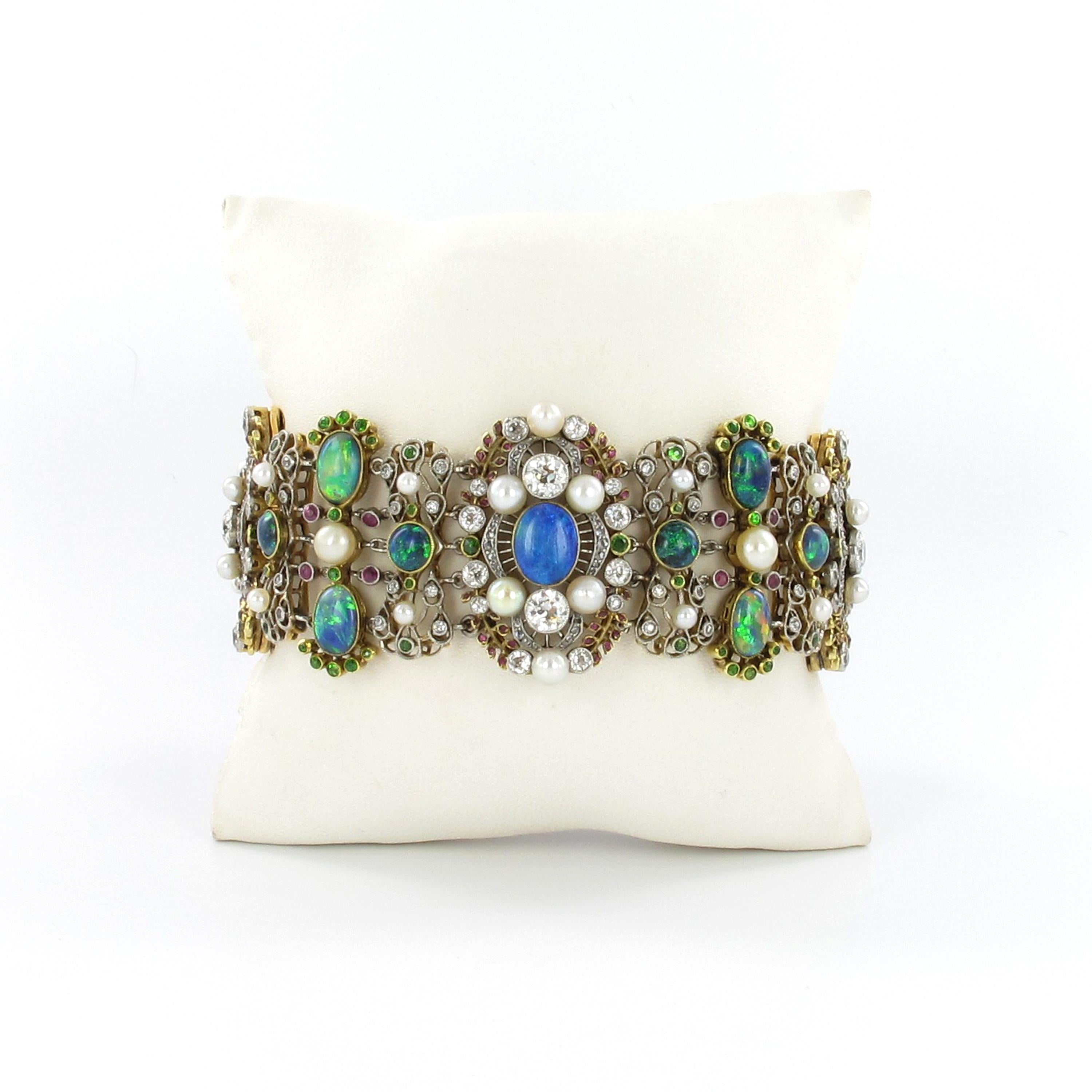This unique and fantastic bracelet by renowned jeweller Rothmuller of Munich dates back to around 1908. 

Honoured with the exclusive title of court jeweller (Hofjuwelier) in 1908, Karl Rothmuller was one of the most sought-after jewellery artists
