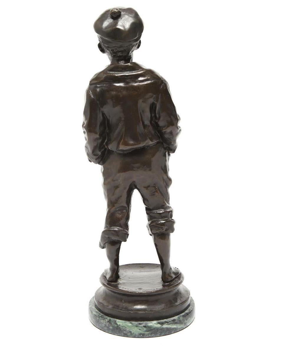 le siffleur bronze statue
