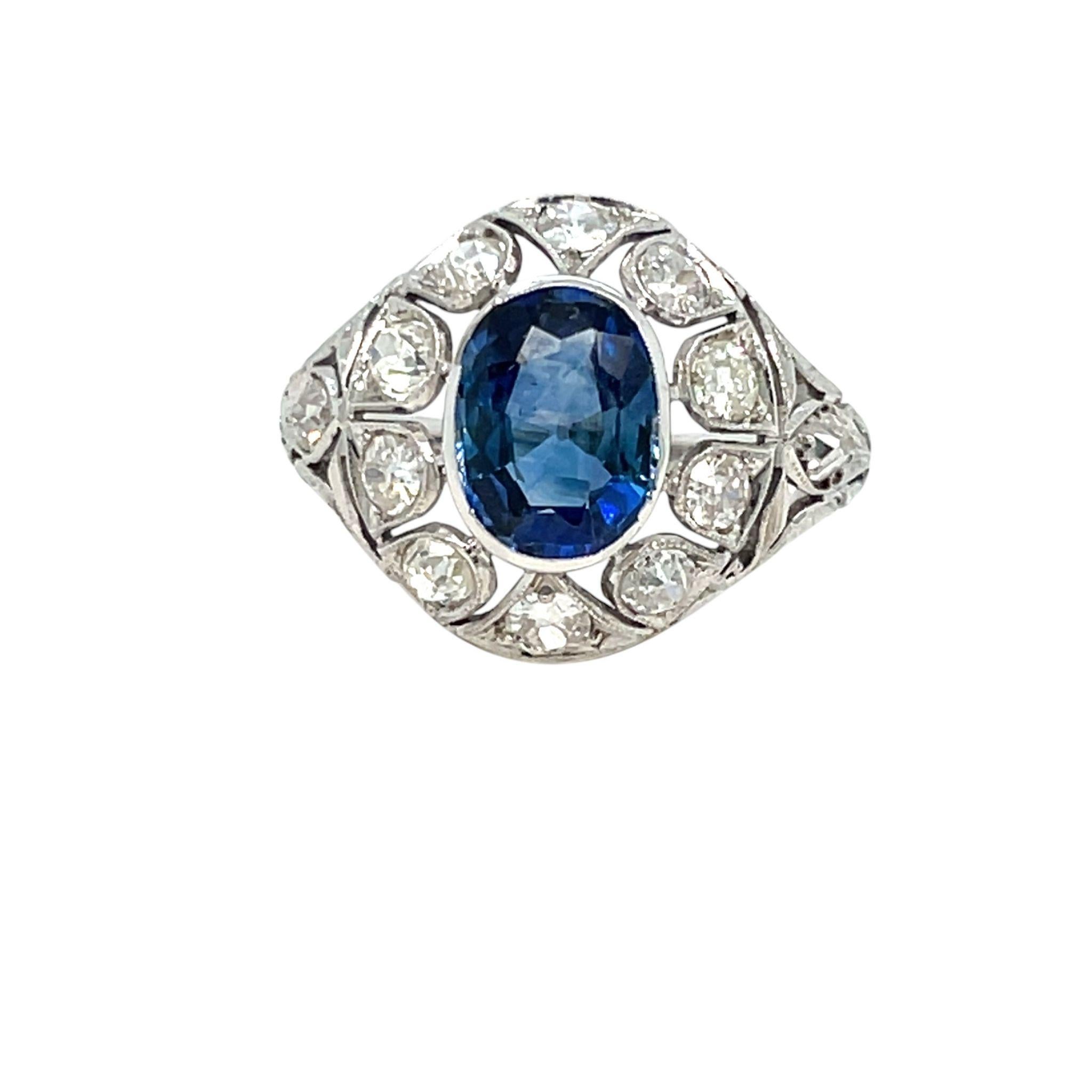 An exquisite filigree ring set in 18k gold, authentic from Art Nouveau era, featuring a beautiful 2.44 ct Oval-cut Sapphire, surrounded by 2.50 carats of old cut diamonds. 
The Sapphire is accompanied by a Gemological certificate.

There are not