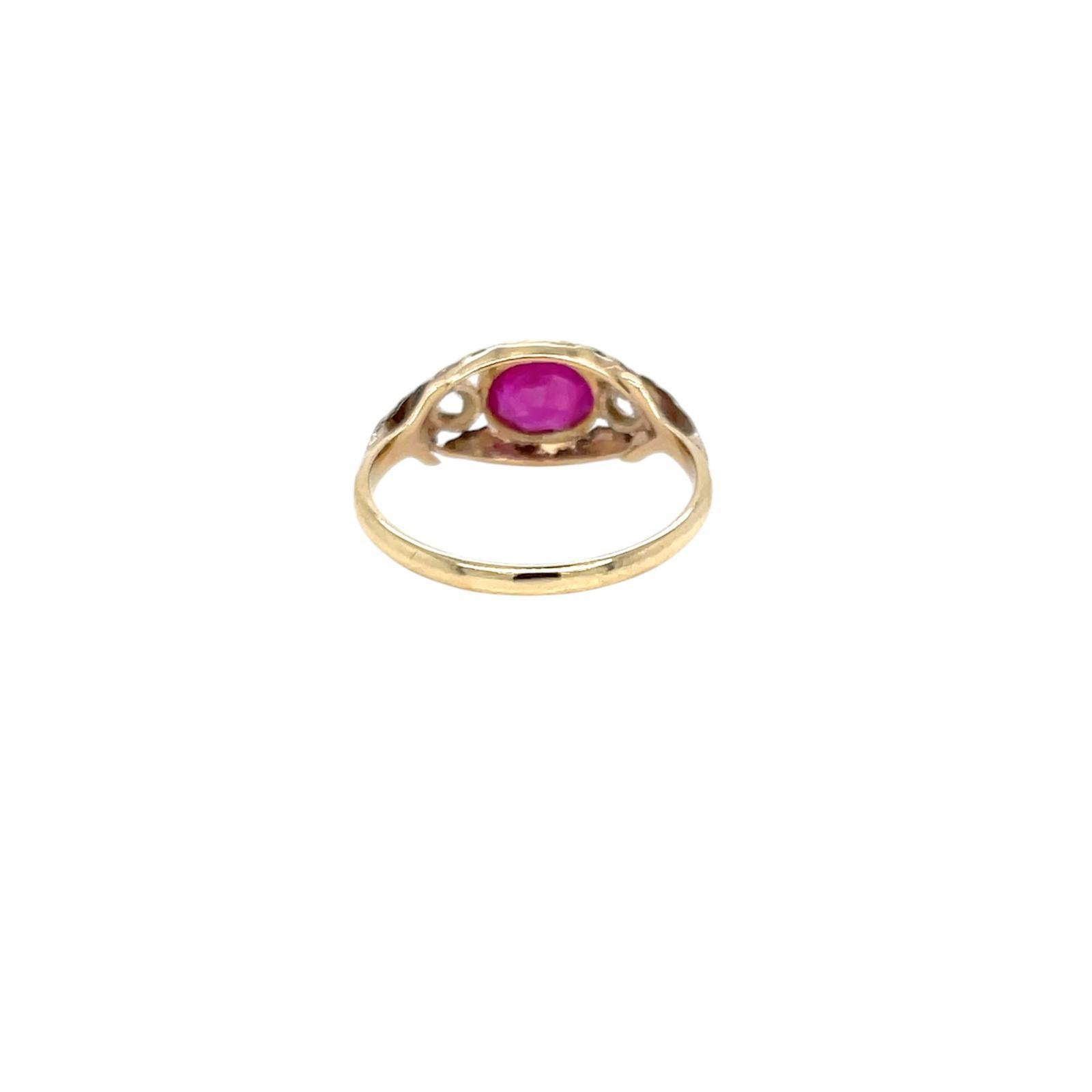 Beautiful ring, handcrafted in 18k yellow and white Gold, featuring in the center a natural Burma No Heat Ruby 1.29 carat, and surrounded by two colorless round old mine cut diamonds, 0,20 carats total. The engraved band make this ring unique.