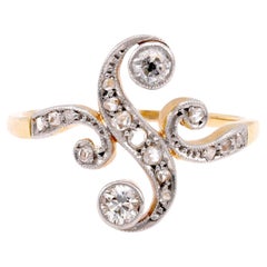 Antique Belle Époque Diamond 18K Yellow Gold and Silver Swirl Ring