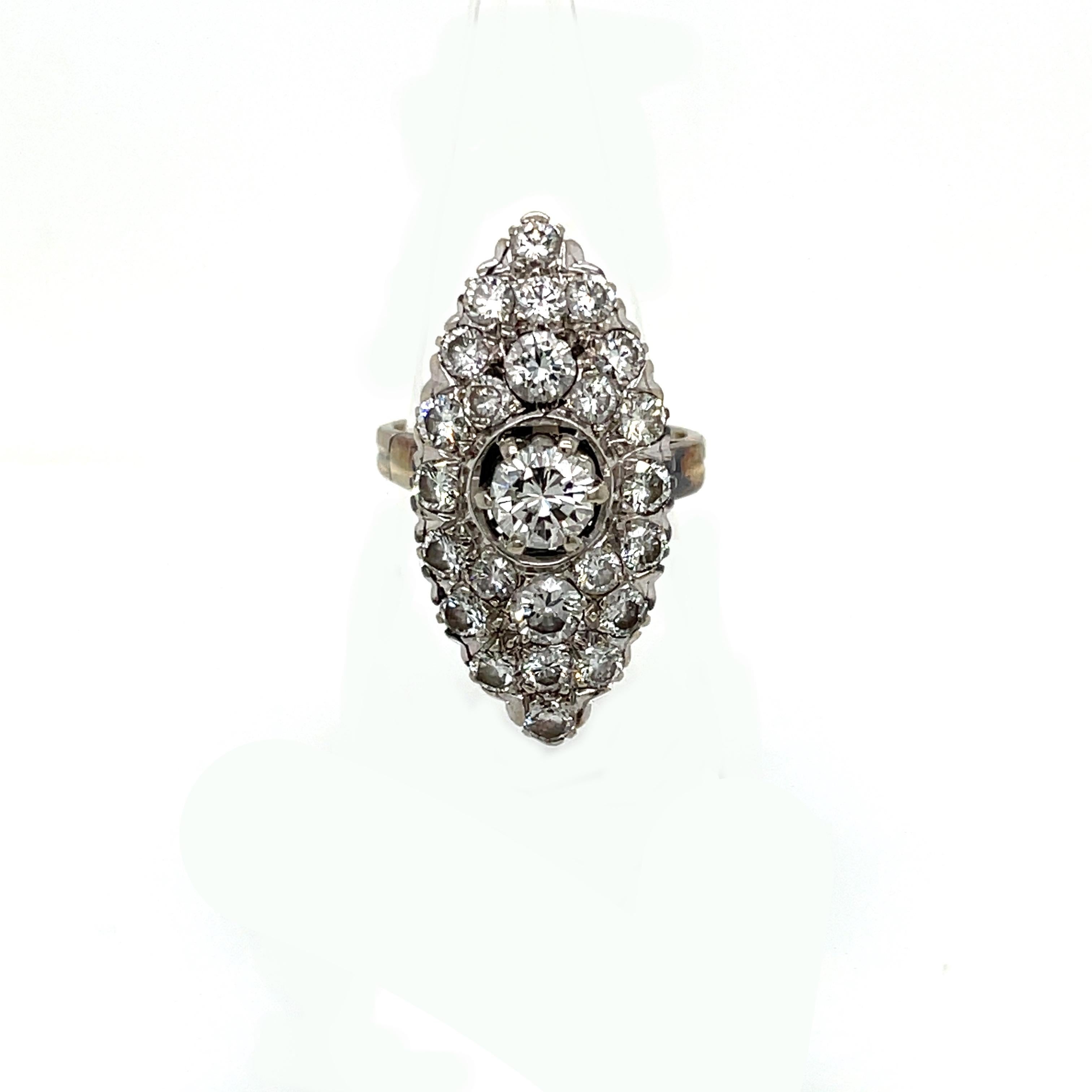 Beautiful 18k Gold handmade genuine Belle Époque ring.
It features two rows of Old European Cut diamond, total weight 1,80 ct. graded VS clarity G/H color, and in the center a sparkling Old European Cut diamond, weight ct 0,50 graded VS clarity G