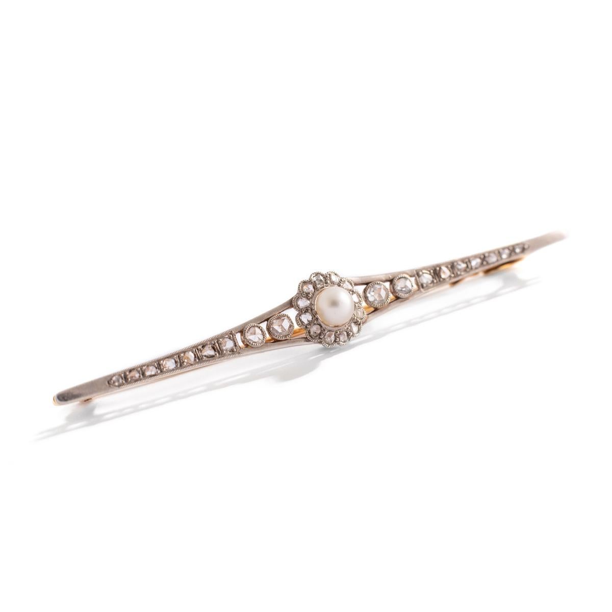 Belle Epoque Diamond Pearl Barrette Brooch.
Total length: 8.00 centimeters.
Central stylized flower pattern Diameter: 0.75 centimeter.
Gross weight: 6.59 grams.