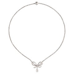 Belle Époque Diamond Platinum Bow Pendant Necklace