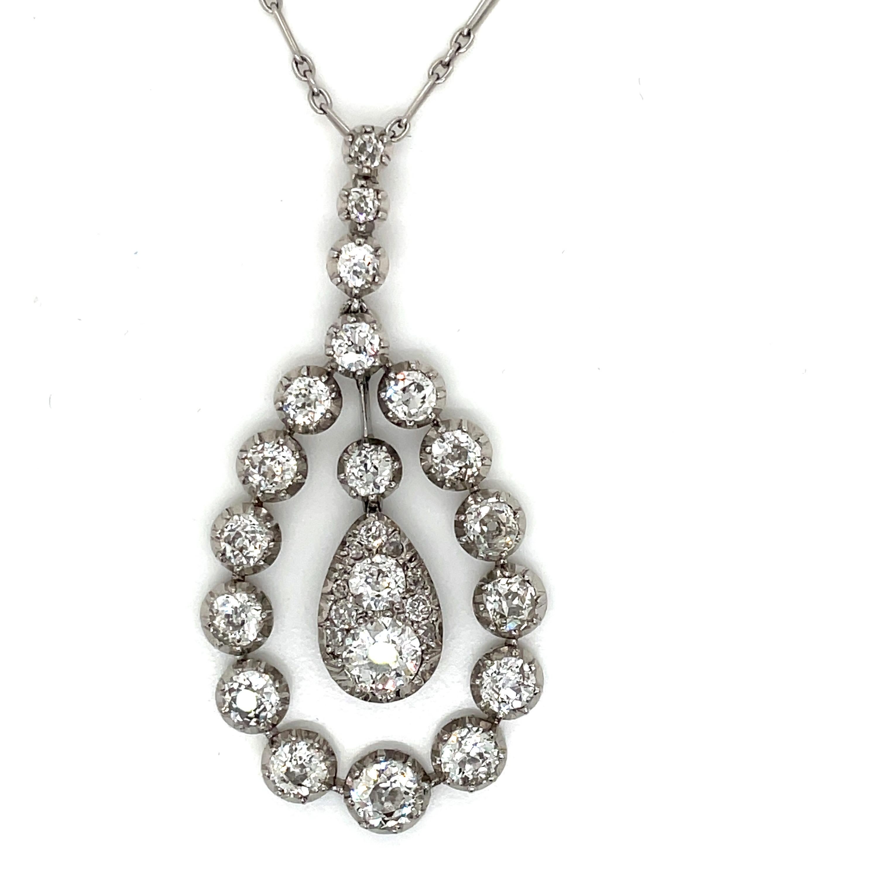 Precious platinum pendant with a typical Belle Epoque design. Handcrafted at the beginning of the 20th century, it is set with approximately 7,0 ct of old mine cut diamonds (VS clarity - H/I color).

CONDITION: Pre-owned - Excellent
METAL: