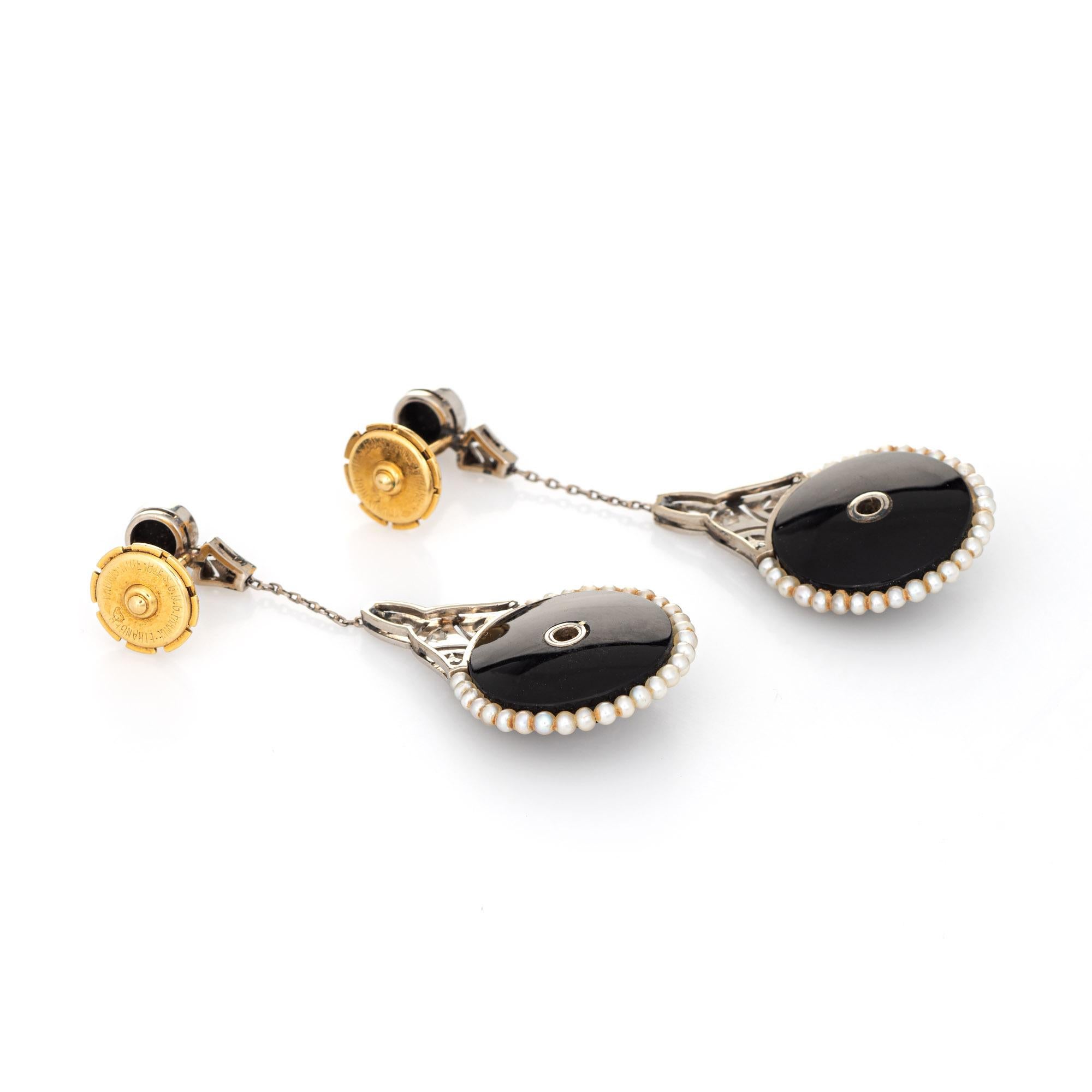 Elegant pair of antique Belle Epoque earrings set with diamonds, onyx and seed pearls (circa 1900s to 1910s). 

Old European and rose cut diamonds total an estimated 0.18 carats (estimated at H-I color and SI2-I1 clarity). The onyx measures 14mm