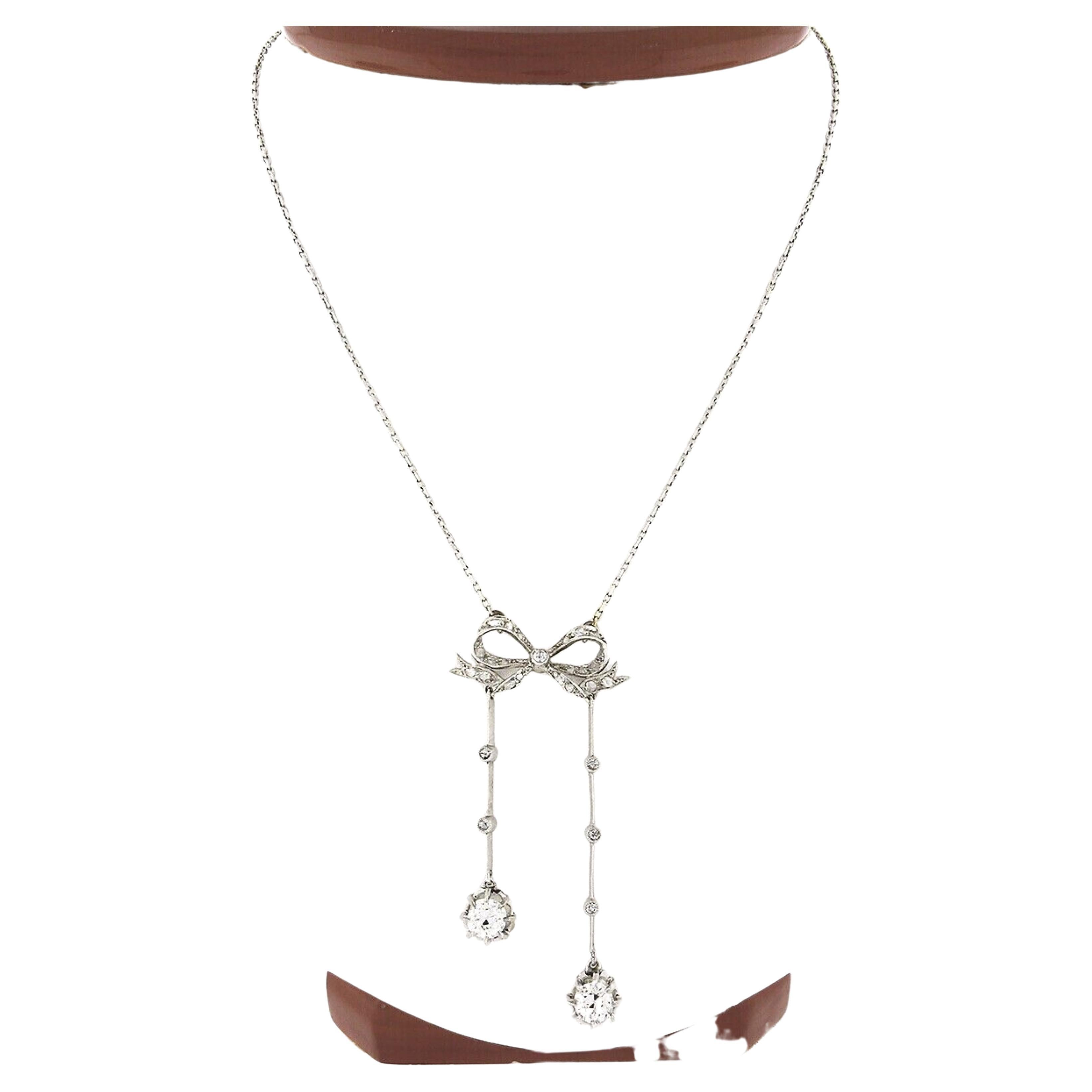 Belle Epoque French 18K White Gold European Diamond Bow Dangle Anhänger Halskette im Angebot