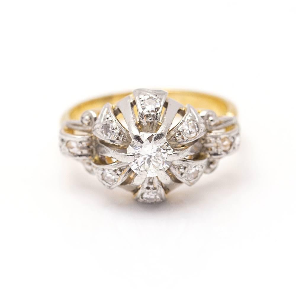 Vintage Belle Époque 1940's two-tone ring for woman  11x Brilliant Cut Diamonds with a total weight of approx. 0,55ct  Size 14,5 can be adapted to other sizes (ask for quotation)  18kt Yellow Gold and 950 Platinum  5,87 grams.  This ring is in
