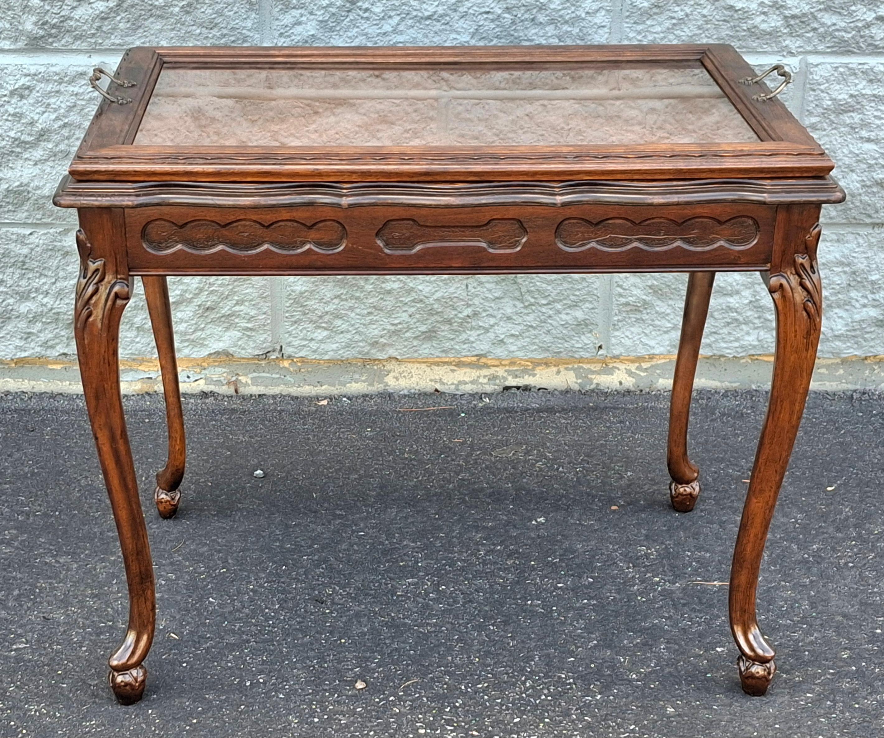 A Freshly restored Belle Epoque French Louis XV Style Bookmatched top Side Table with Glass Serving Tray with brass handles.
Measures 24.5