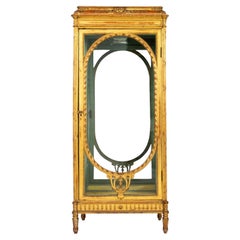 Vitrina in legno dorato in stile Belle Epoque Luigi XVI