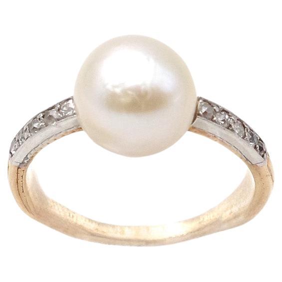Bague Belle Epoque en perles de mer naturelles avec diamants en 18k et platine