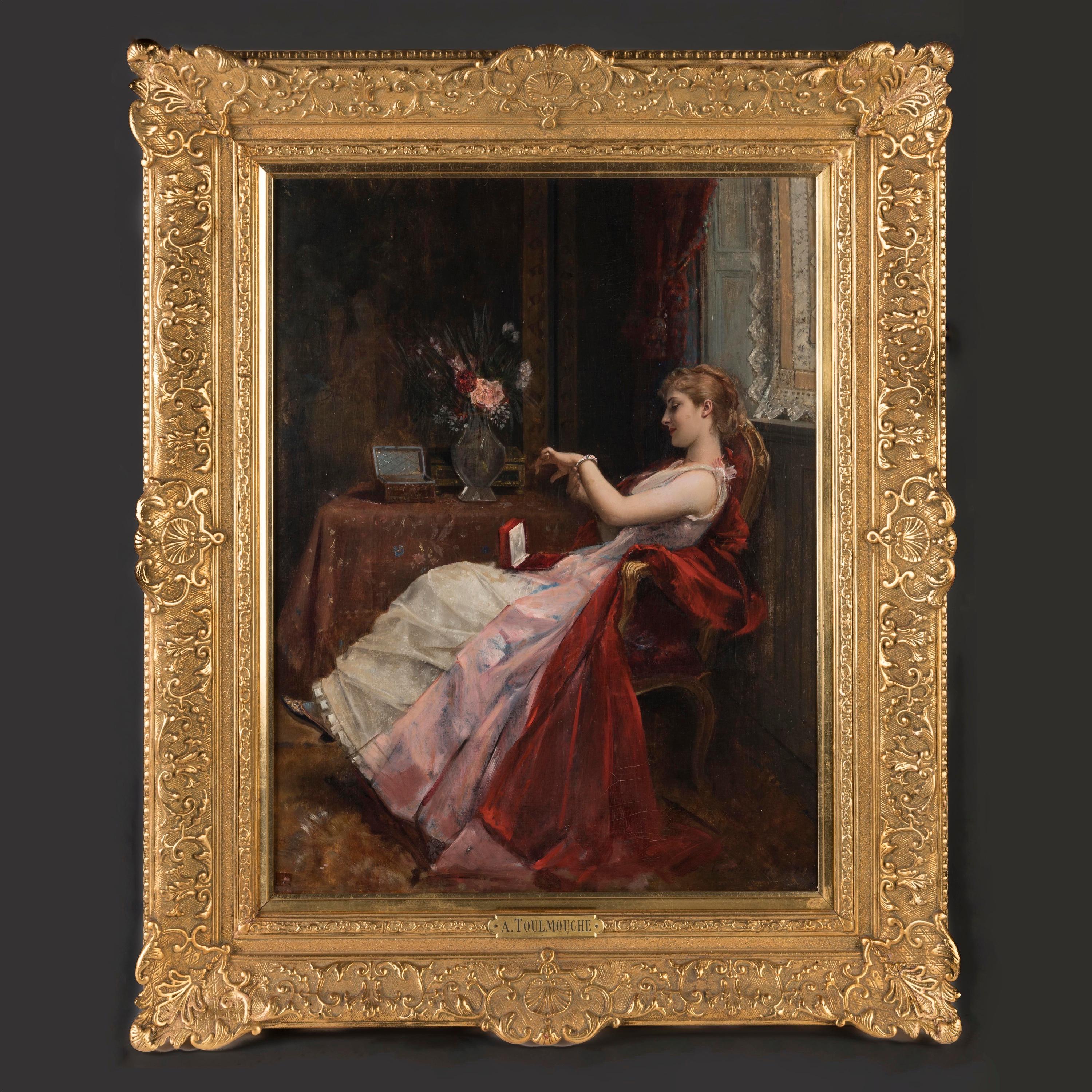 An Elegant Lady Admiring her Present
By Auguste Toulmouche (1829-1890)

An Oil on Canvas work depicting a well-heeled young lady, seated in her pink gown, admiring her new bracelet around her wrist. Signed and dated by the artist, bottom